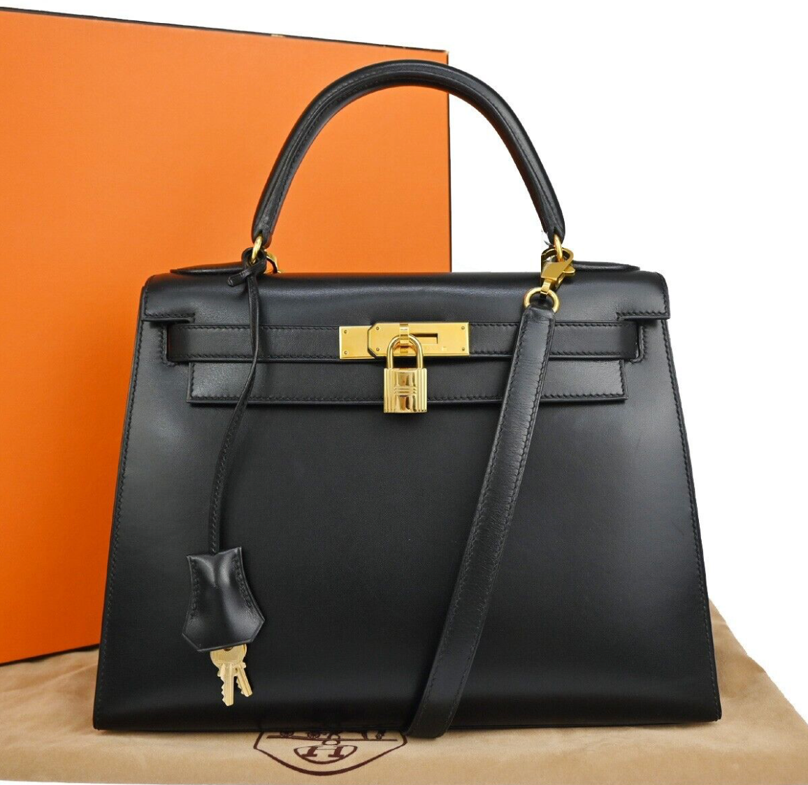 Black Hermes Kelly 28 handbag with a strap