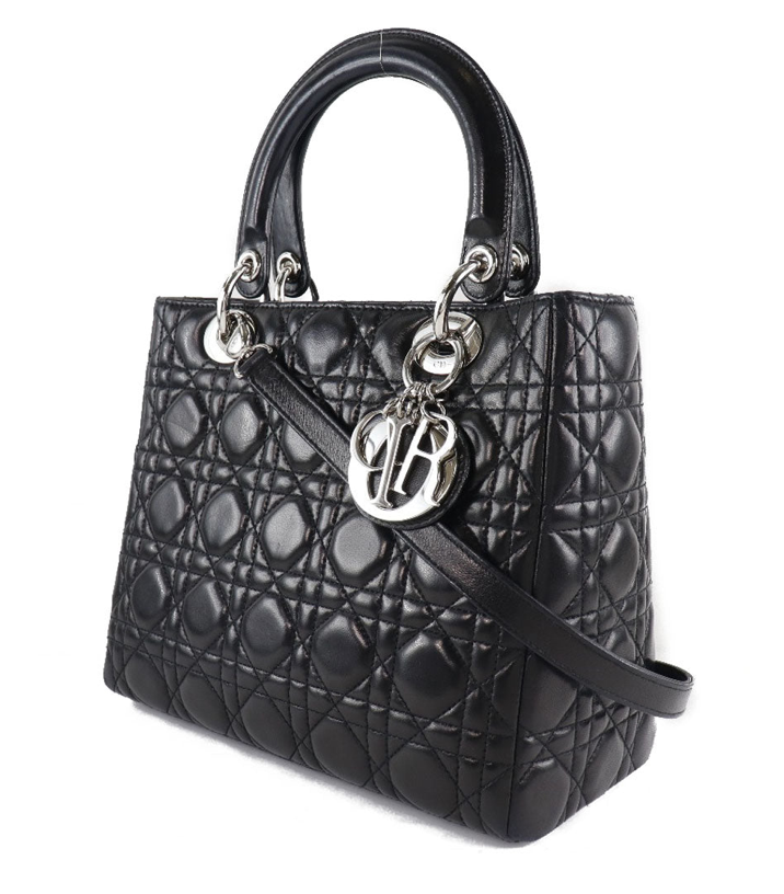 Lady Dior medium size black lambskin handbag with a long strap