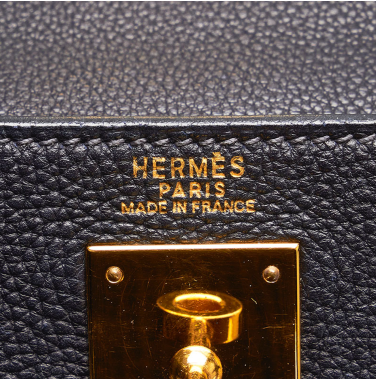 Hermès Kelly 32 Retourne 手提包採用黑色 Vache Ardennes 皮革製成