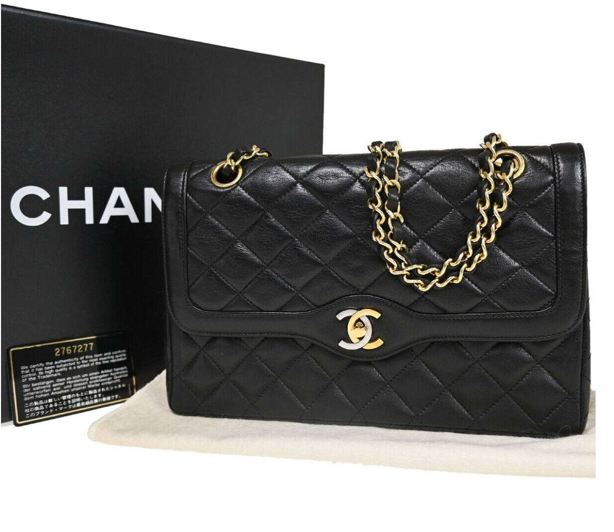 Bolso vintage CHANEL de doble solapa con cierre bicolor en juego completo