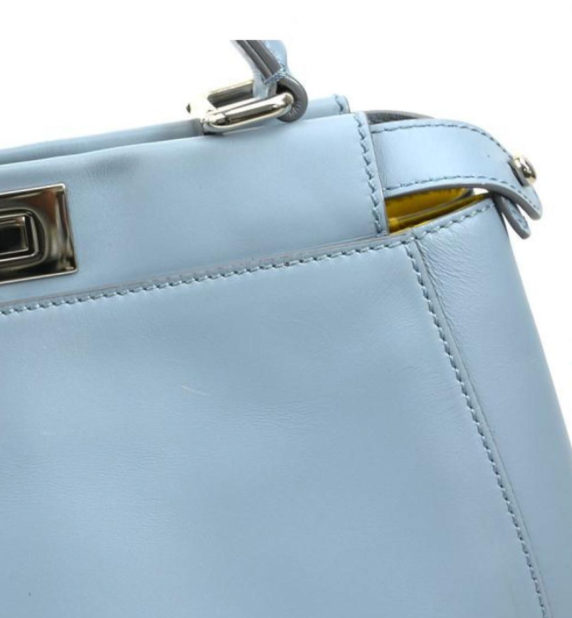 Pre-owned medium Fendi Peekaboo handbag of light blue leather and silver hardware with a long strap