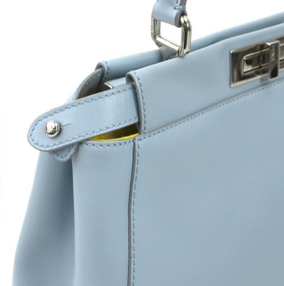 Pre-owned medium Fendi Peekaboo handbag of light blue leather and silver hardware with a long strap