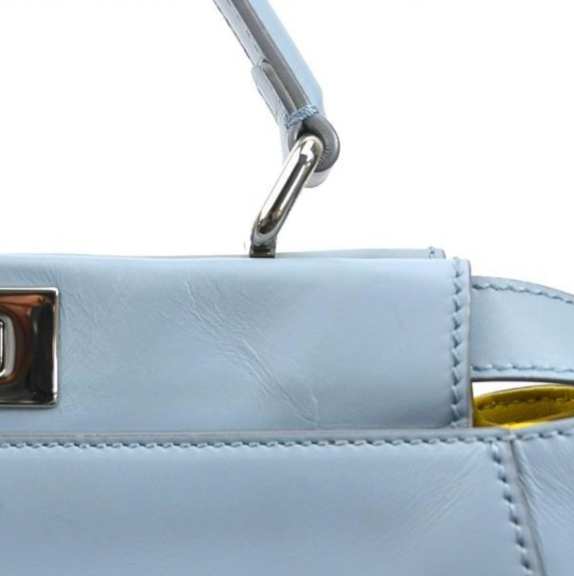 Pre-owned medium Fendi Peekaboo handbag of light blue leather and silver hardware with a long strap