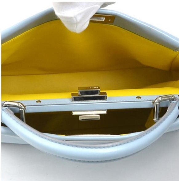 Pre-owned medium Fendi Peekaboo handbag of light blue leather and silver hardware with a long strap