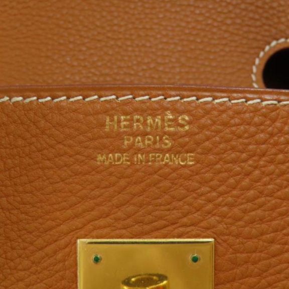 Pre-owned Hermes Birkin 35 handbag is made from Fauve Barenia Faubourg Togo leather with contrasting stitching and gold hardware