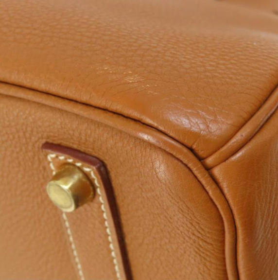 Pre-owned Hermes Birkin 35 handbag is made from Fauve Barenia Faubourg Togo leather with contrasting stitching and gold hardware