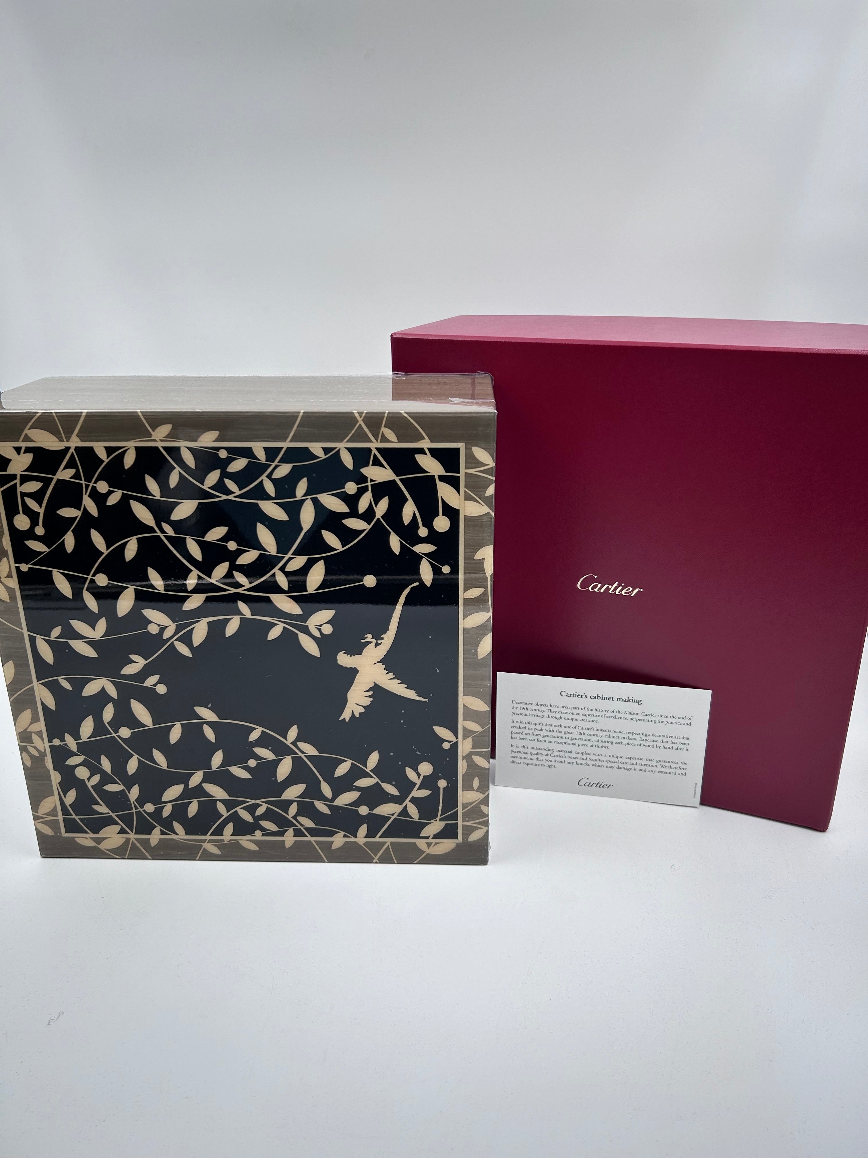 Cartier limited edition jewellery box made of cedar and sycamore wood, featuring an inlay of abalone