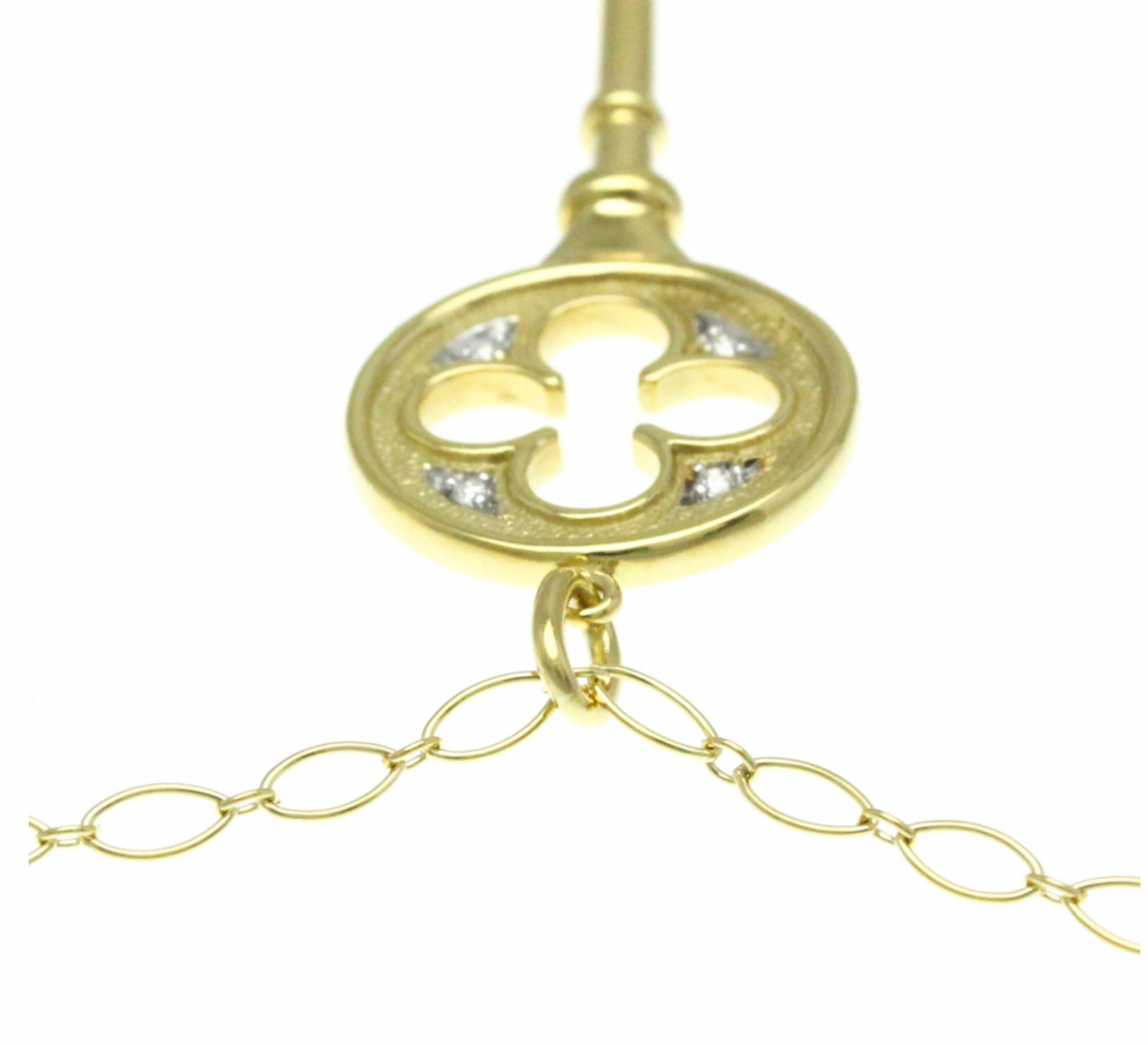 Pre-owned 18k yellow gold Tiffany & Co. Trèfle key necklace with diamonds