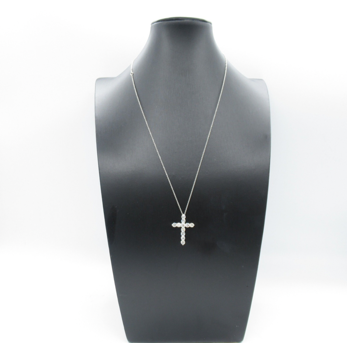 Large Tiffany & Co platinum Cross Pendant with diamonds of total carat weight of 1.71