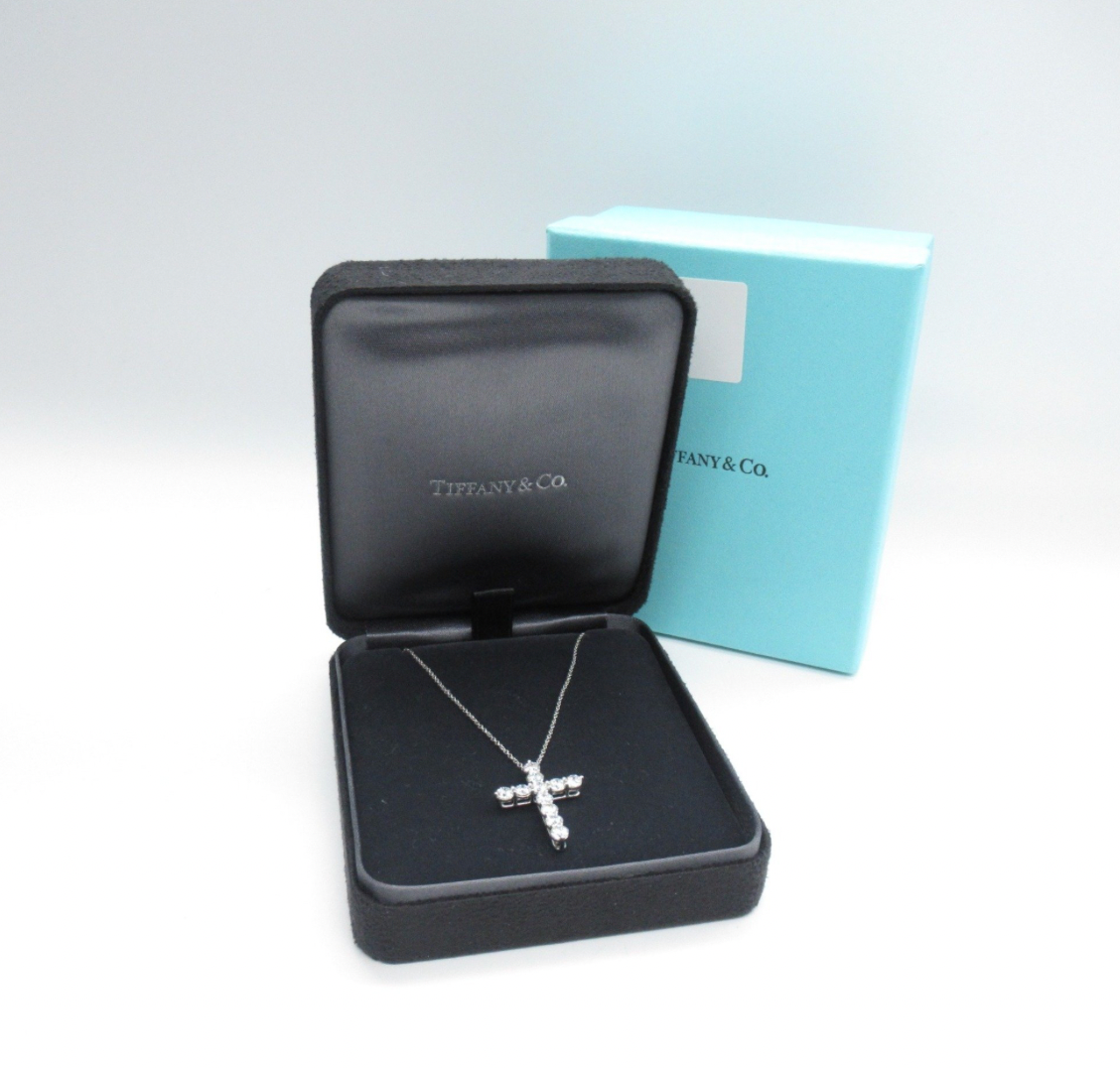 Large Tiffany & Co platinum Cross Pendant with diamonds of total carat weight of 1.71