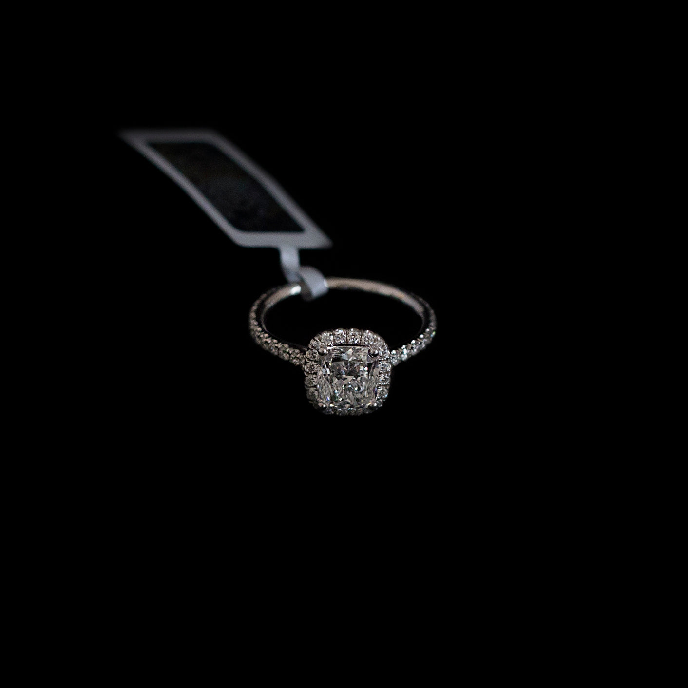 18K white gold engagement ring with a GIA certified 1.50ct cushion cut diamond