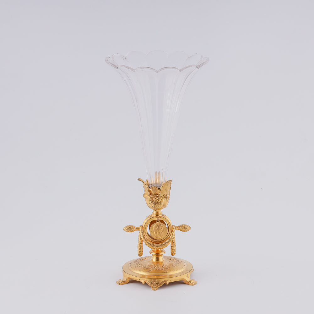 Crystal vase on giraldical gilt bronze plinth with two medallions