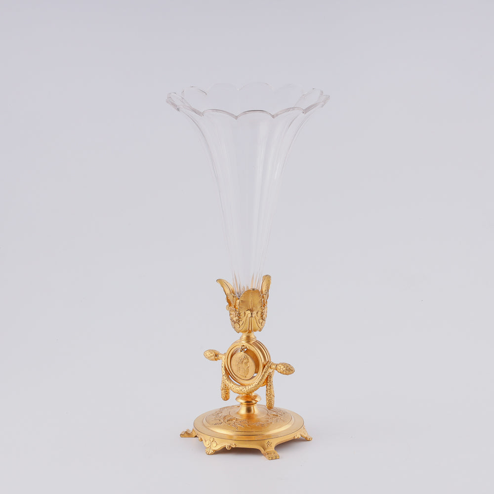 Crystal vase on giraldical gilt bronze plinth with two medallions