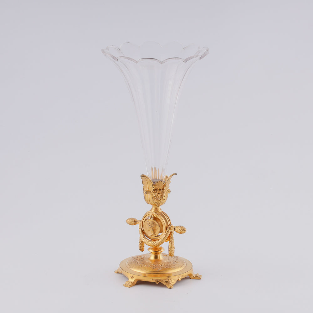 Crystal vase on giraldical gilt bronze plinth with two medallions