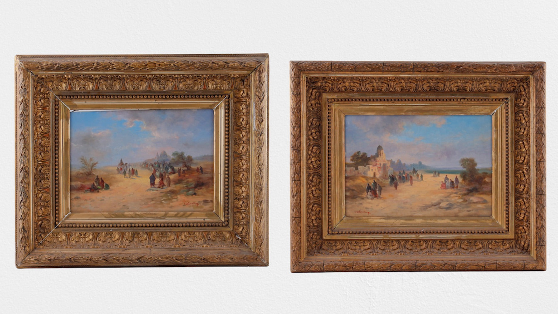 Pair of rural scenary paintings in gold plated frames