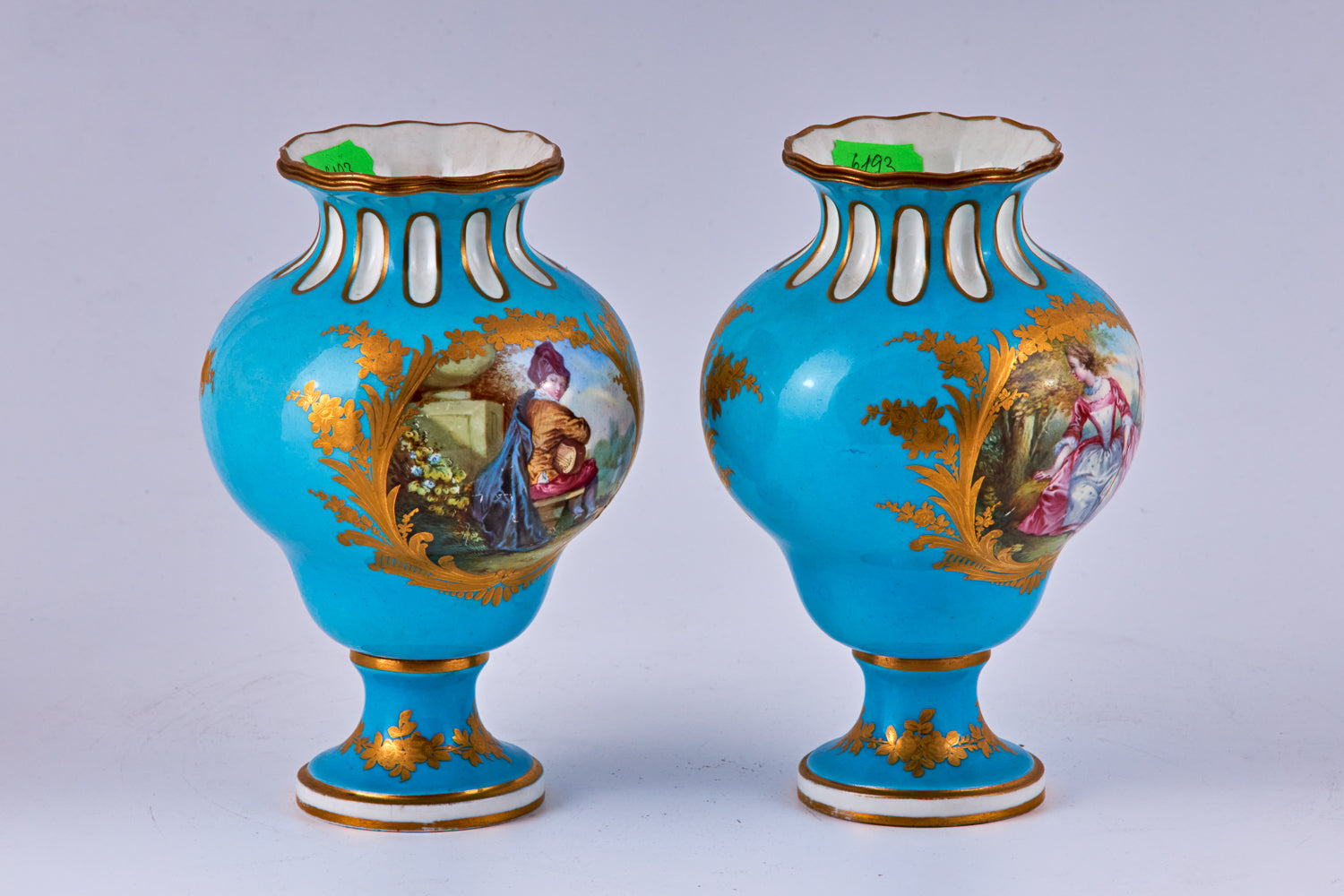 Pair of Sevres blue hand painted porcelain vases with polychromatic decoration