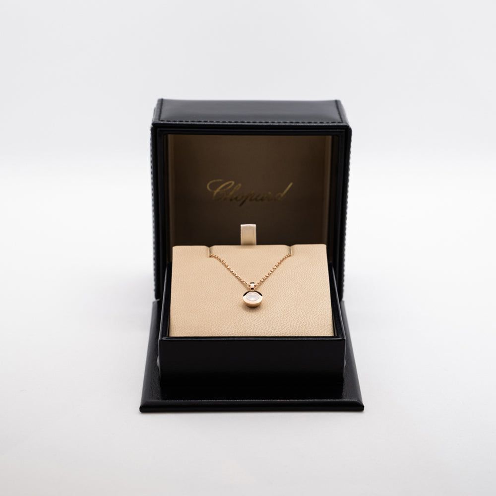 Chopard 18k rose gold Happy Diamonds round pendant from "Icons" collection