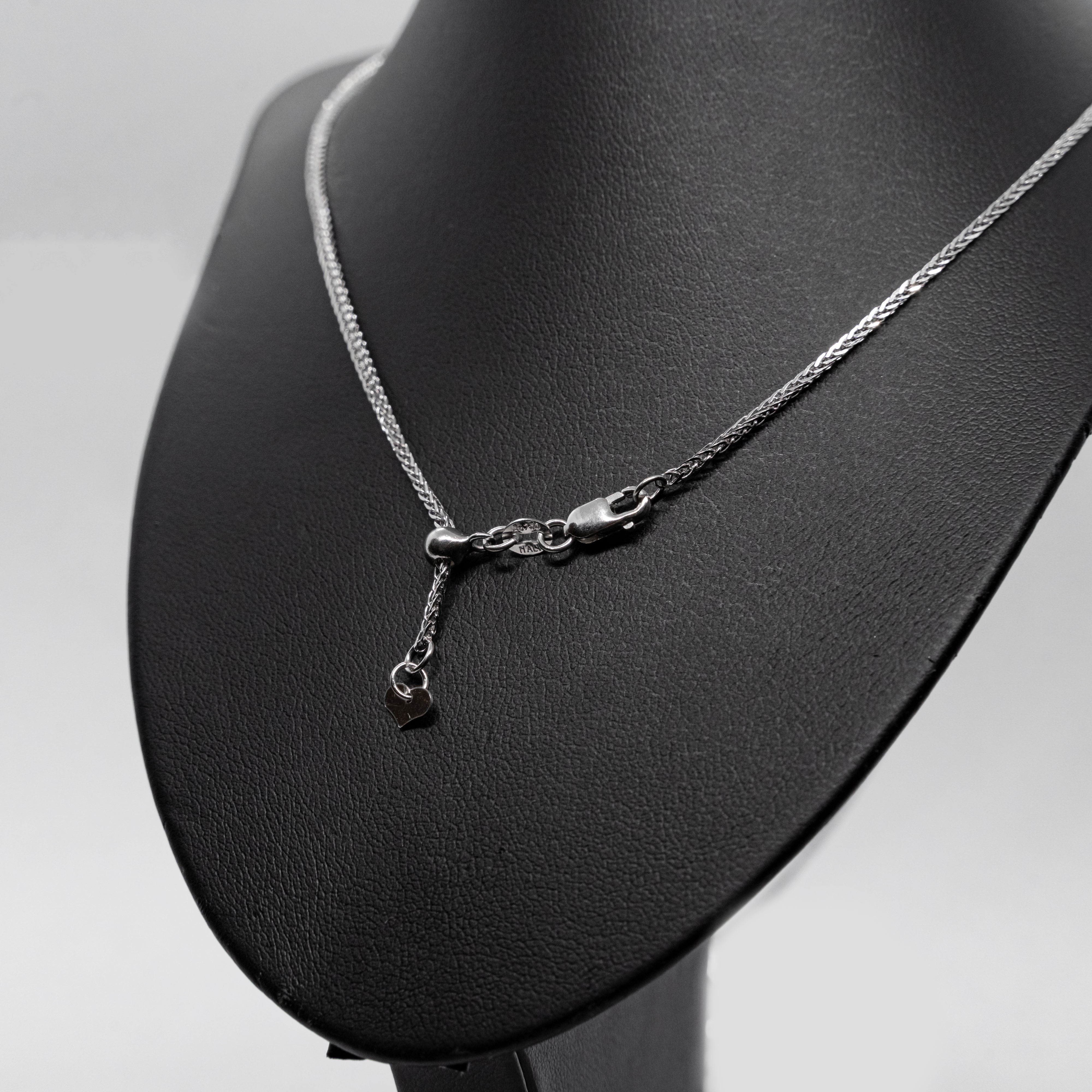 18k white gold Necklace with a diamond cross pendant set with 2,30CTW of natural diamonds