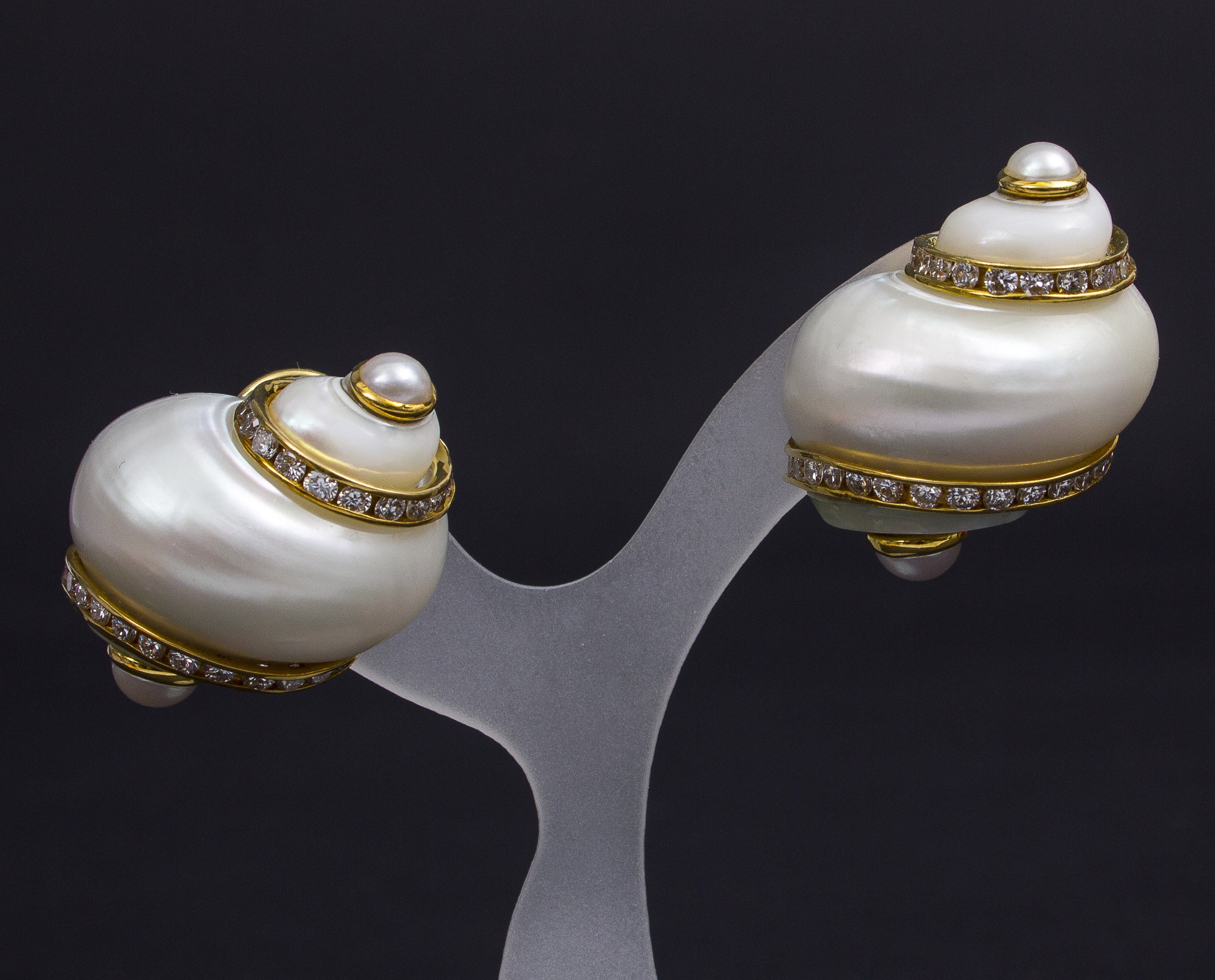 A pair of vintage Turbo Shell Earrings with cultured Pearls by Seaman Schepps