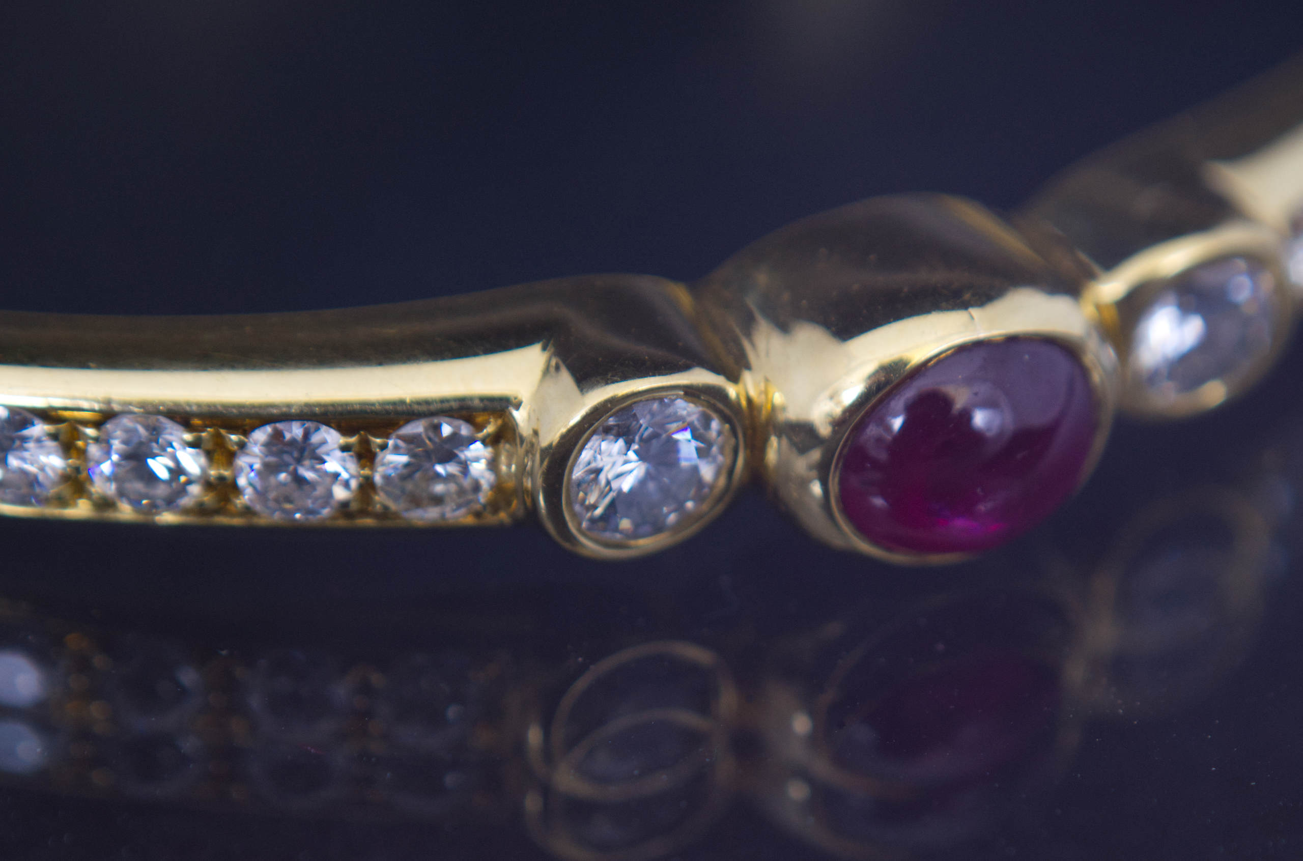 Vintage 18k Yellow gold bracelet set with natural diamonds and one natural ruby