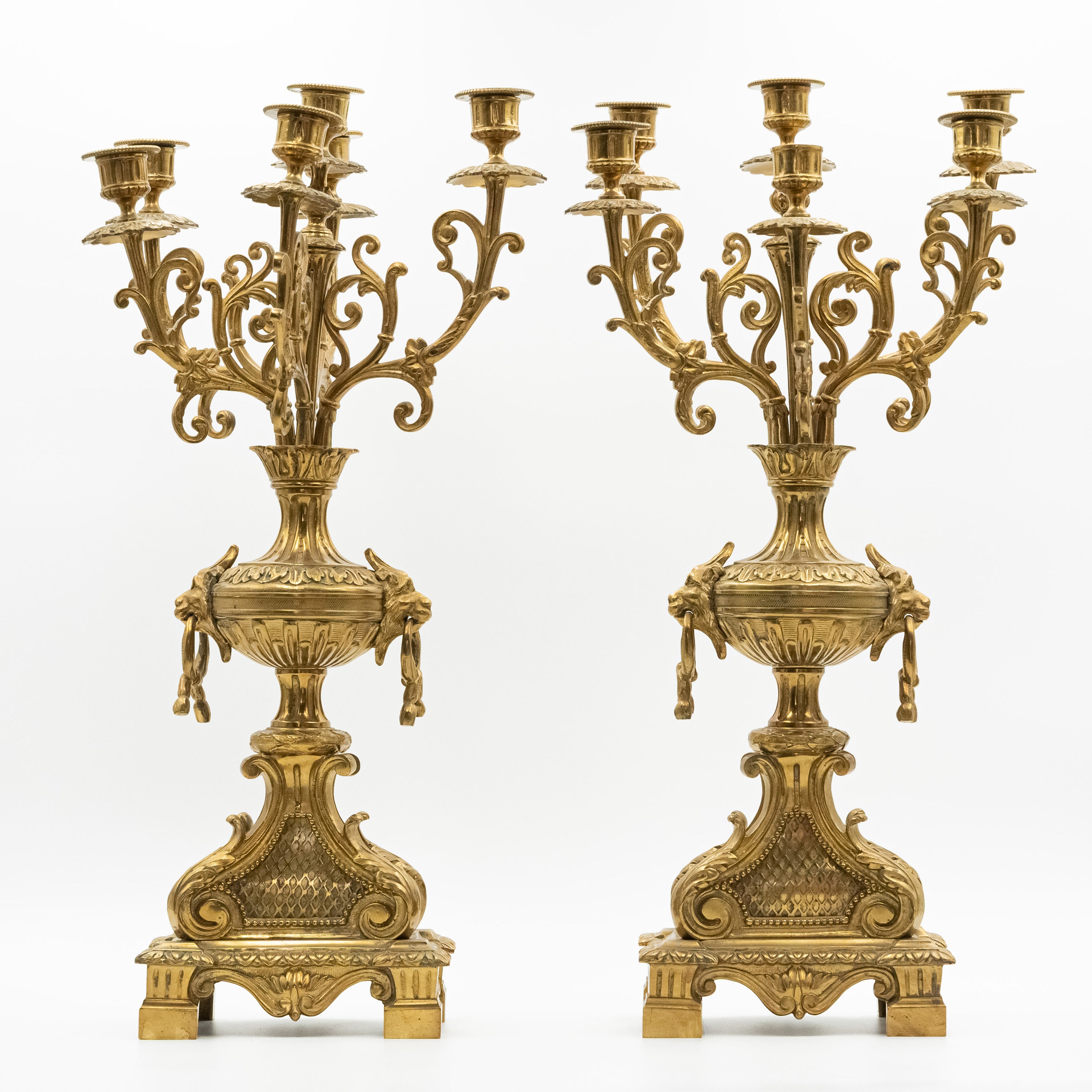 Antique Eclectic style bronze mantel clock with two candelabras in the style of Napoleon 3rd. decor