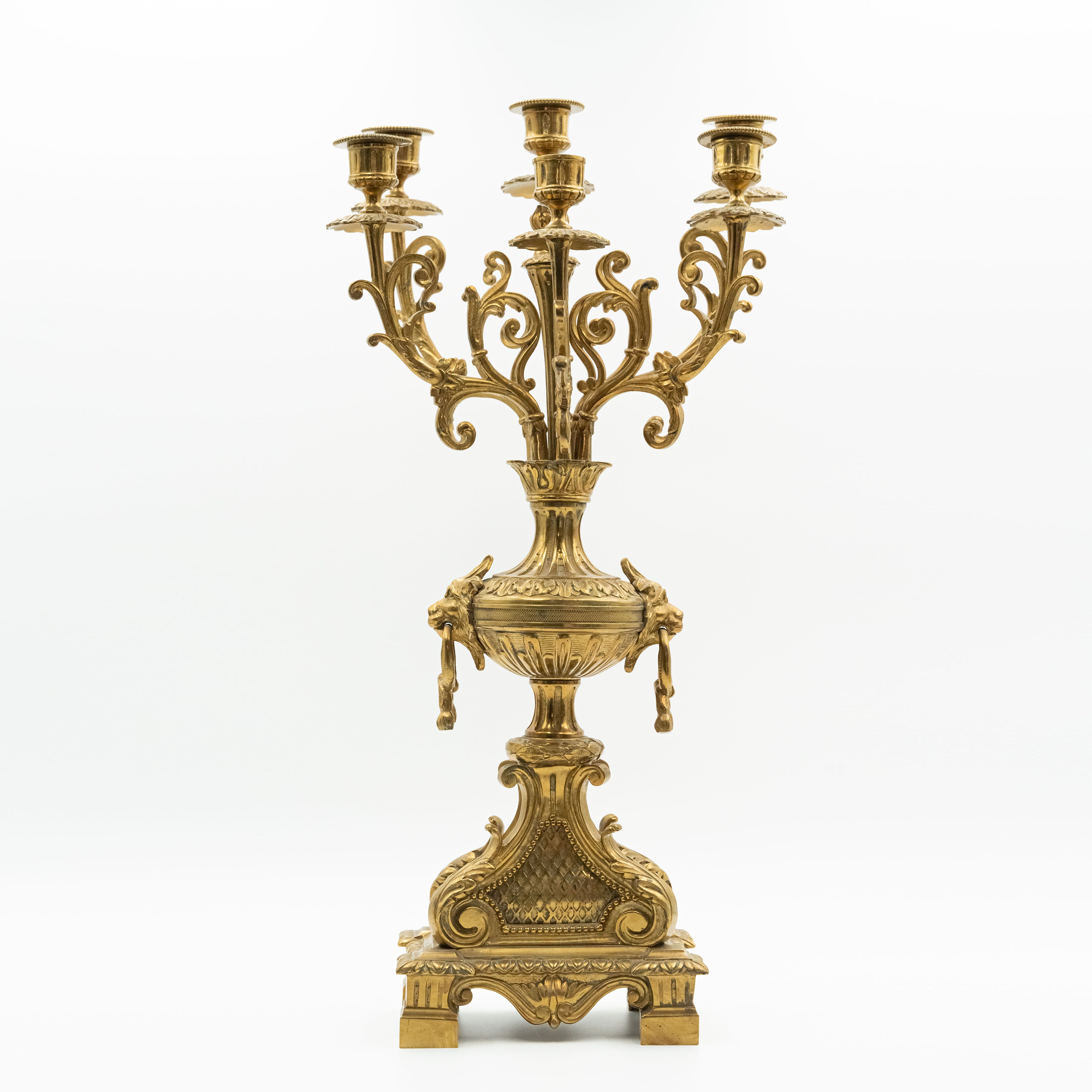 Antique Eclectic style bronze mantel clock with two candelabras in the style of Napoleon 3rd. decor