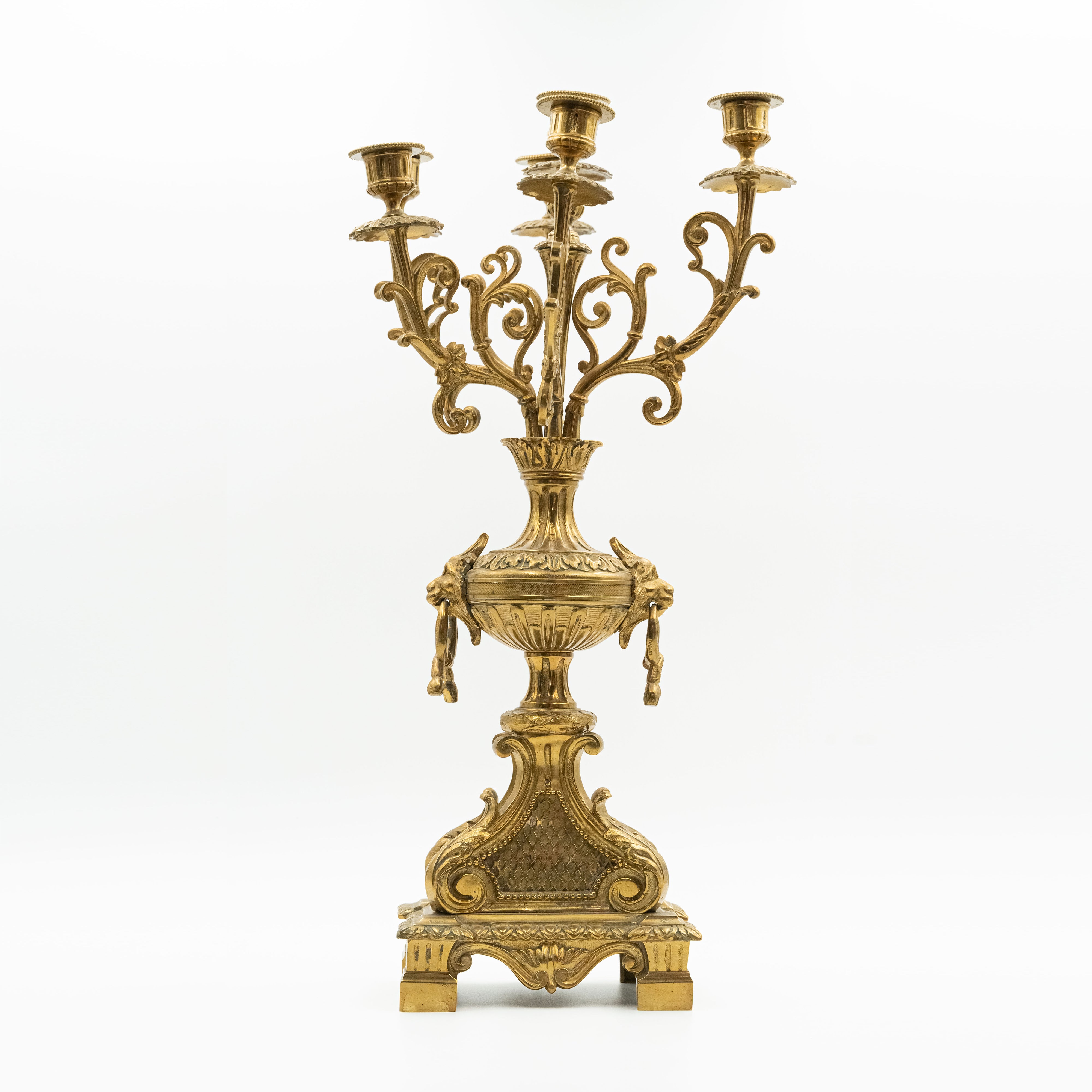 Antique Eclectic style bronze mantel clock with two candelabras in the style of Napoleon 3rd. decor