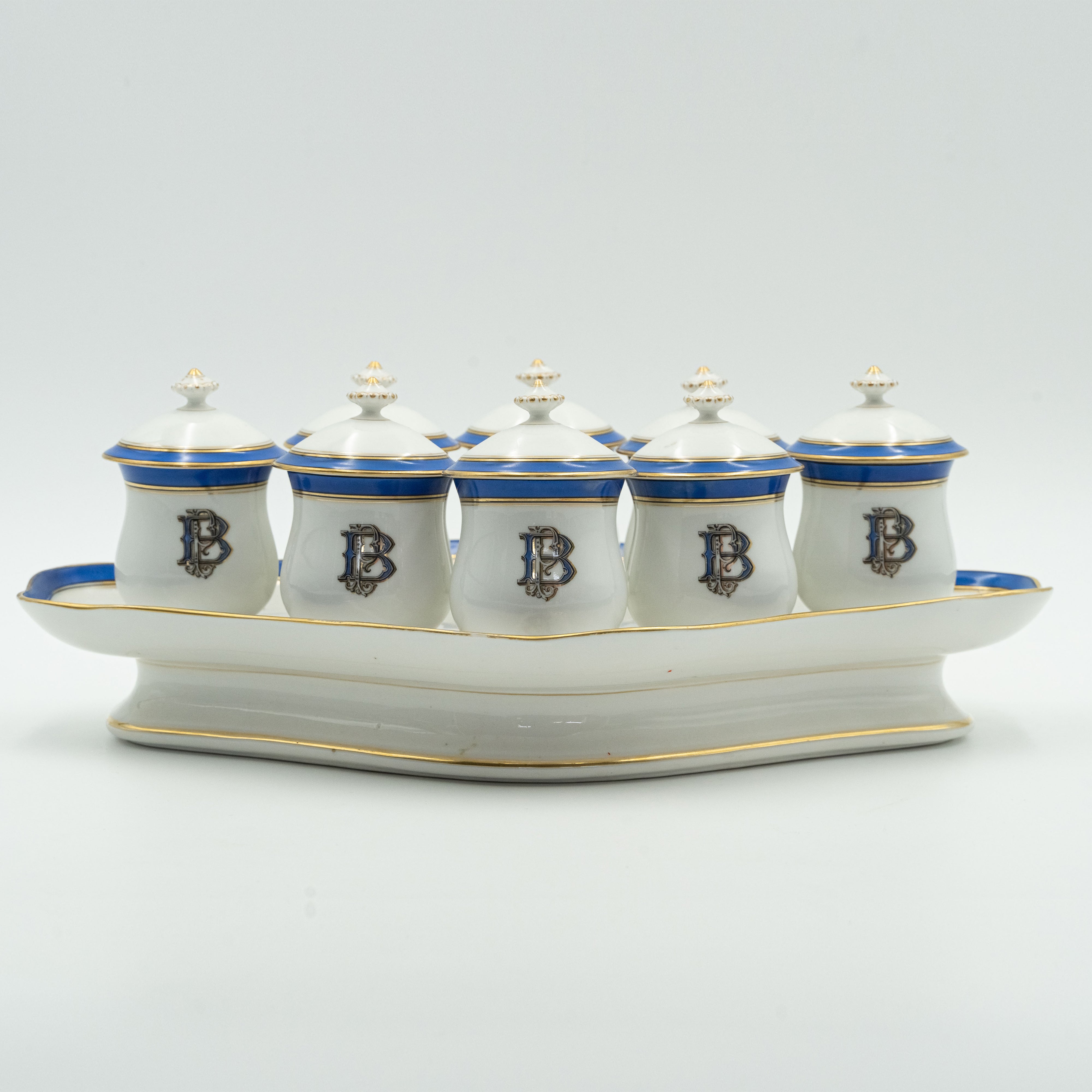 European porcelain set consisting of 9 hot chocolate cups on a serving tray