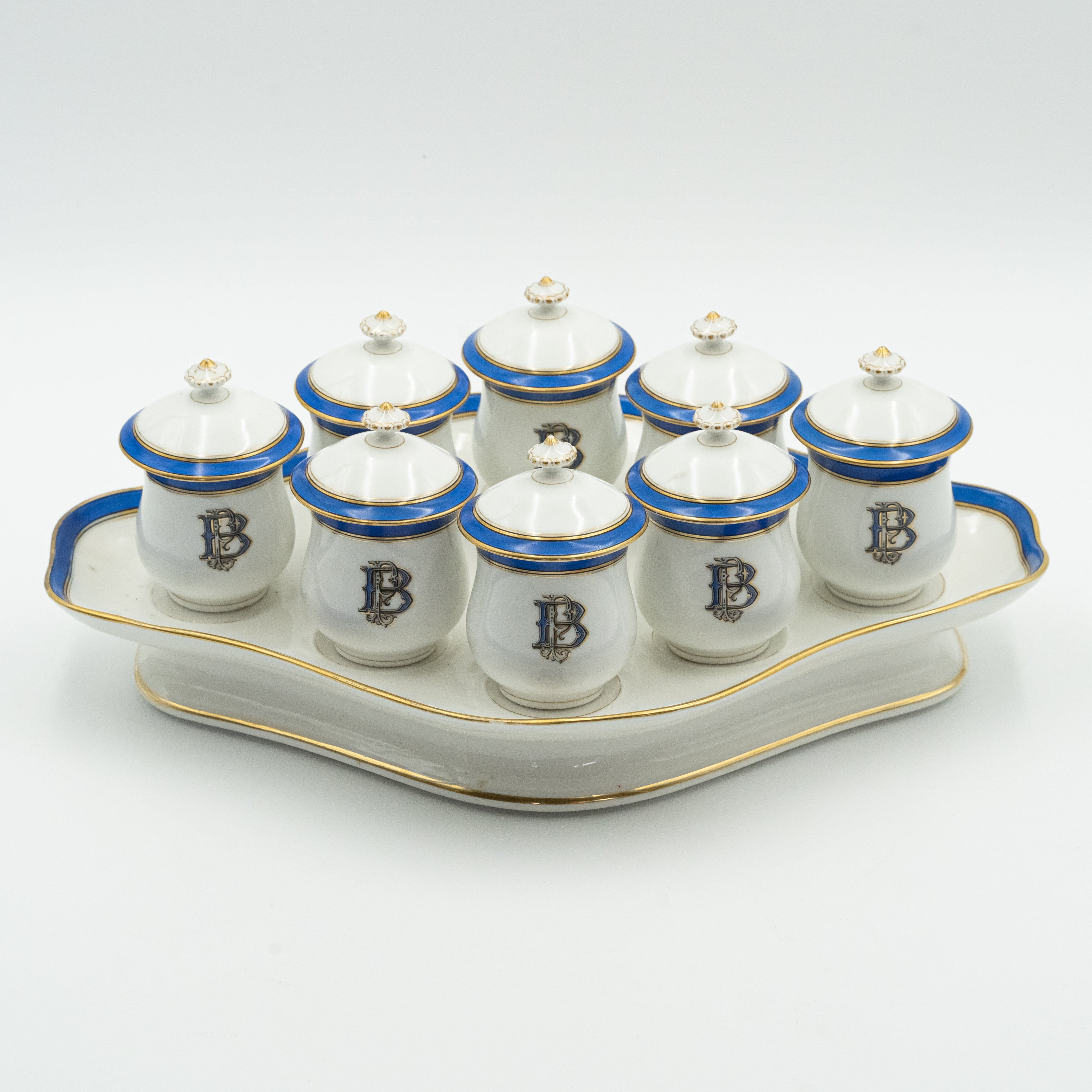 European porcelain set consisting of 9 hot chocolate cups on a serving tray