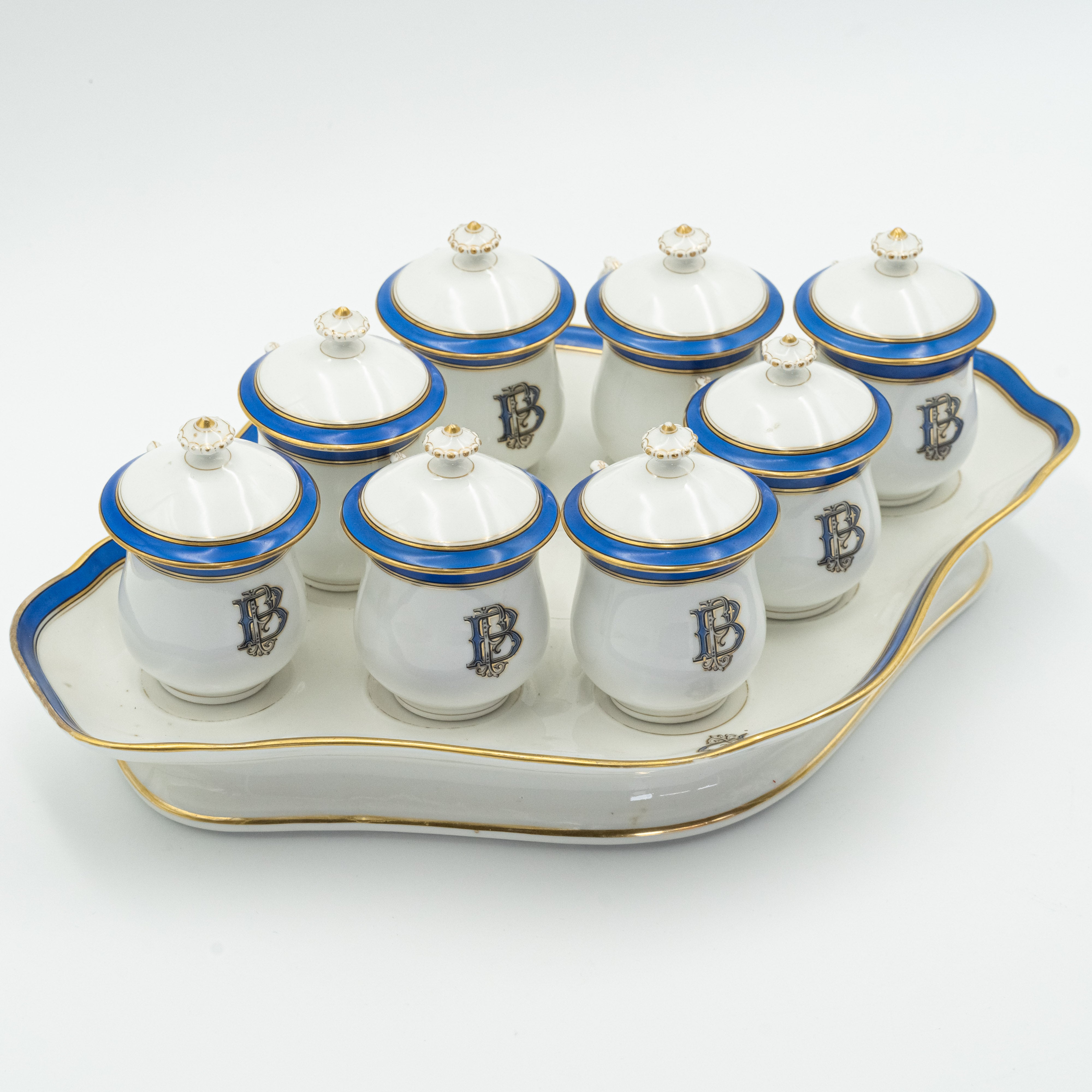 European porcelain set consisting of 9 hot chocolate cups on a serving tray