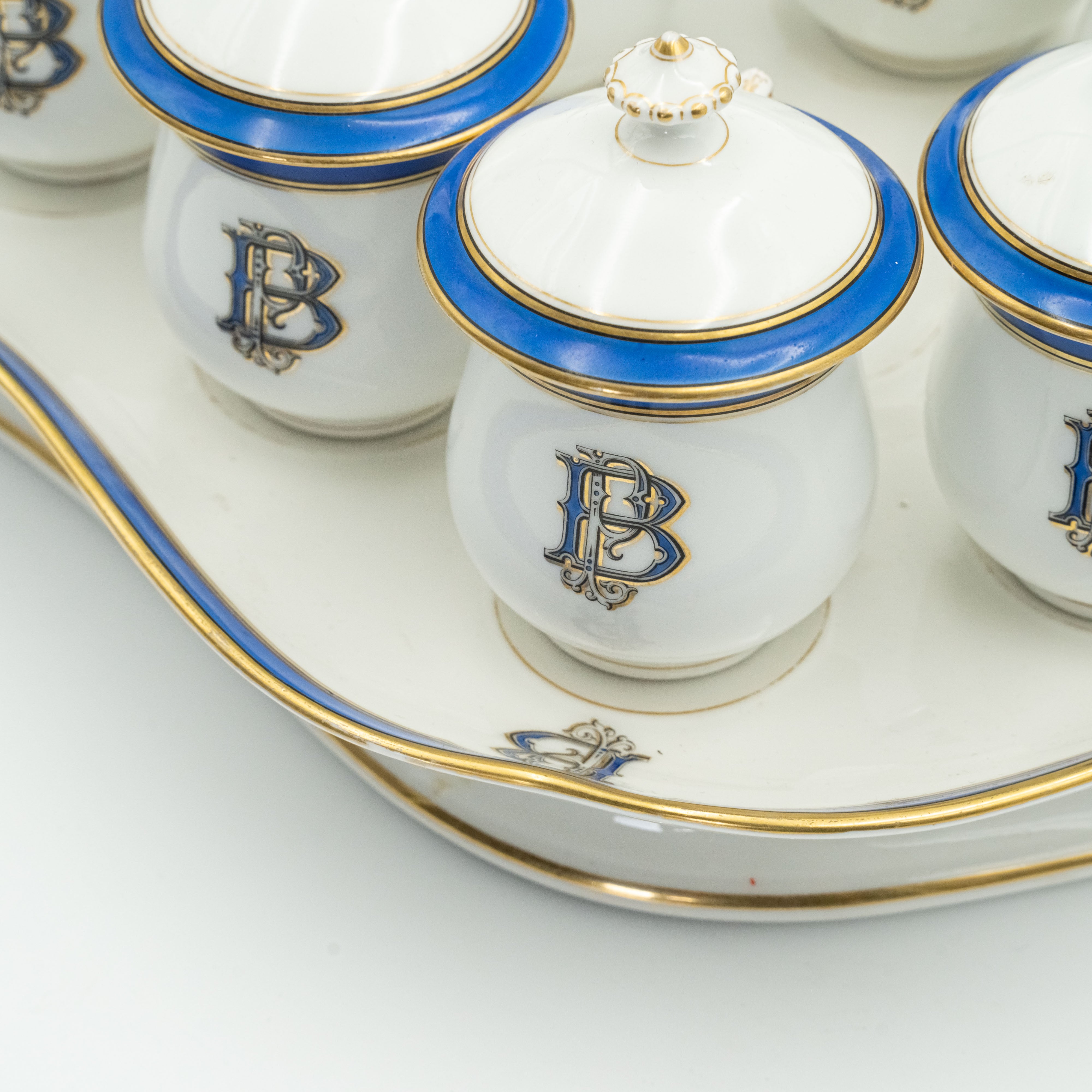 European porcelain set consisting of 9 hot chocolate cups on a serving tray