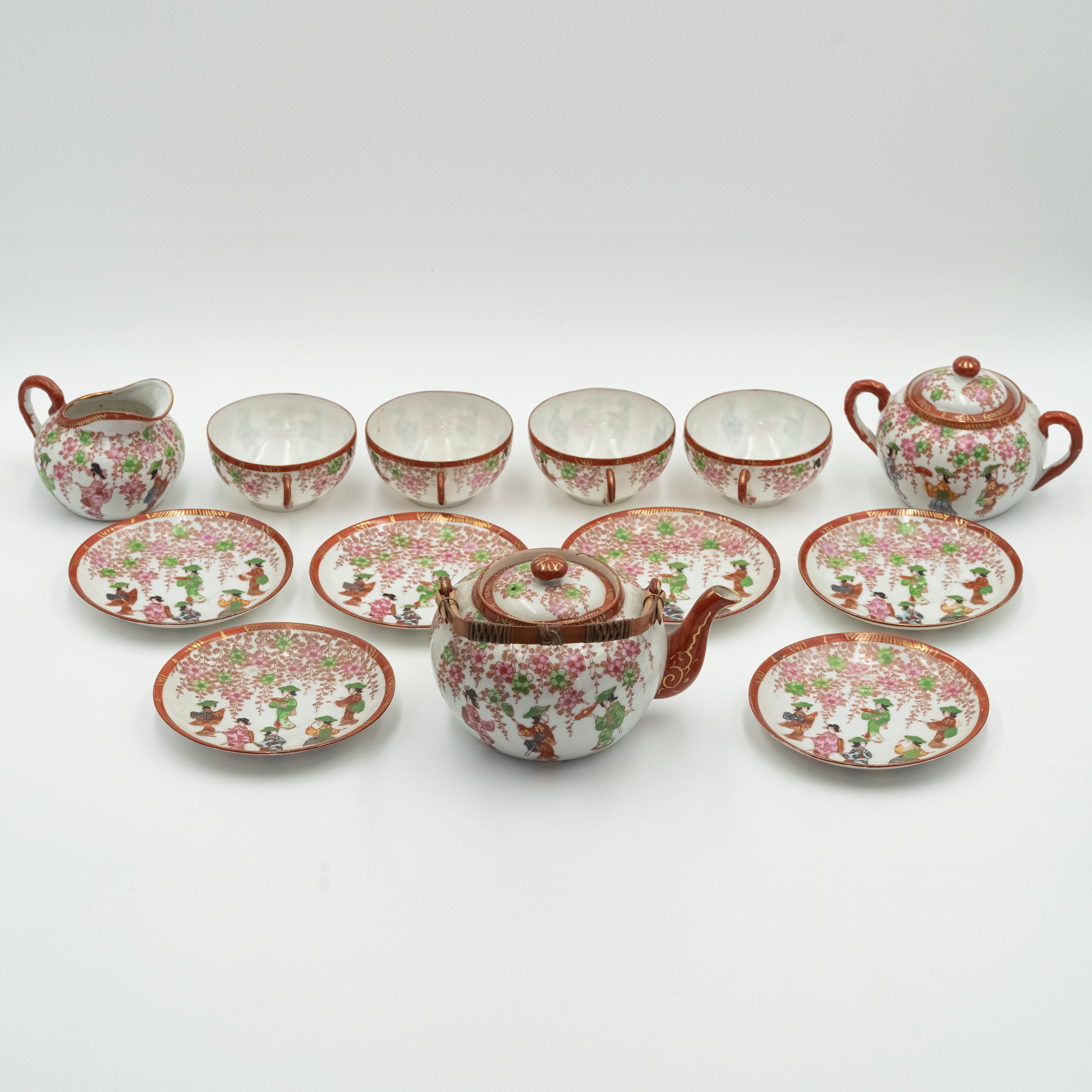 Antique Japanese fine porcelain tea set for 4 persons with hand-painted drawings of Geishas and Samurai