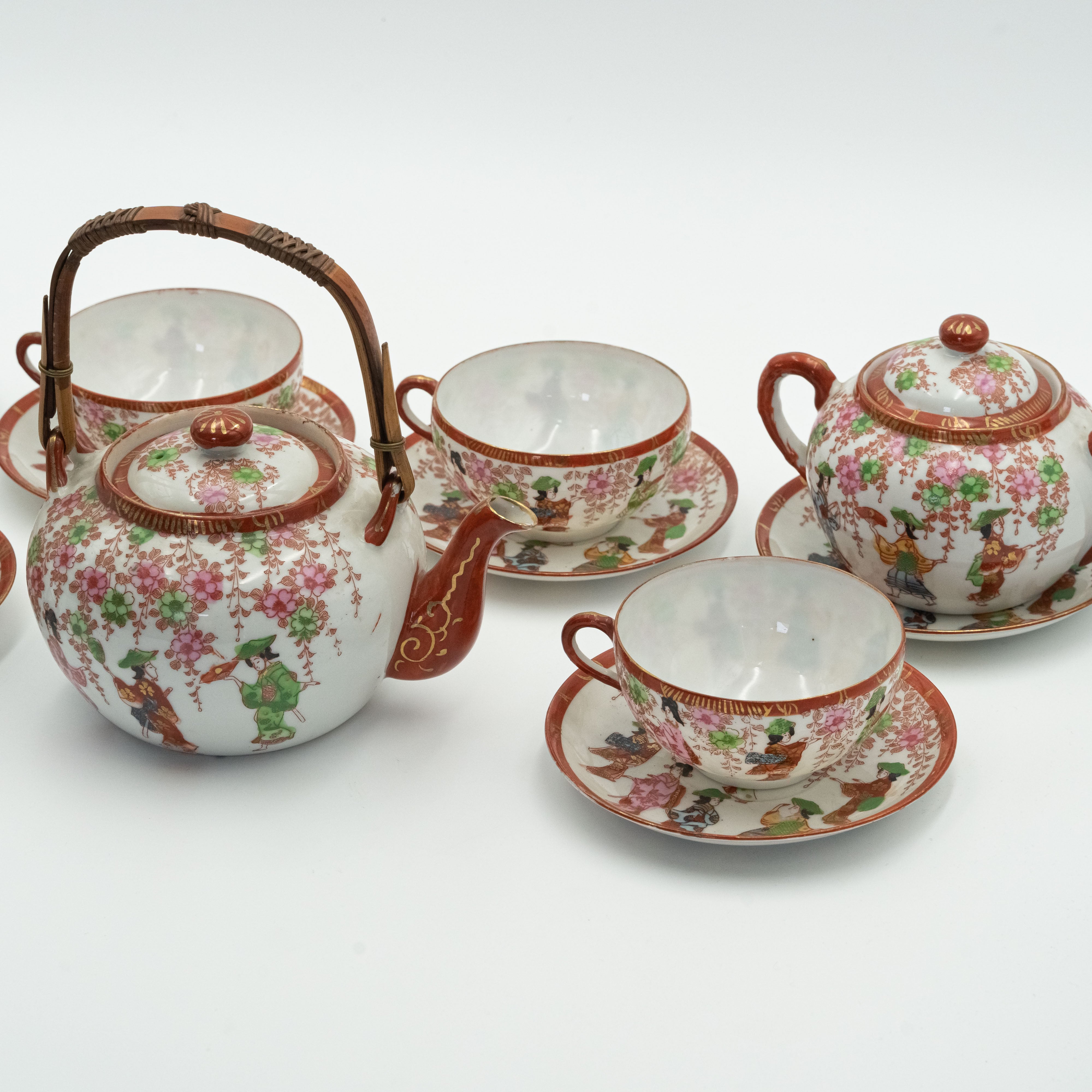 Antique Japanese fine porcelain tea set for 4 persons with hand-painted drawings of Geishas and Samurai