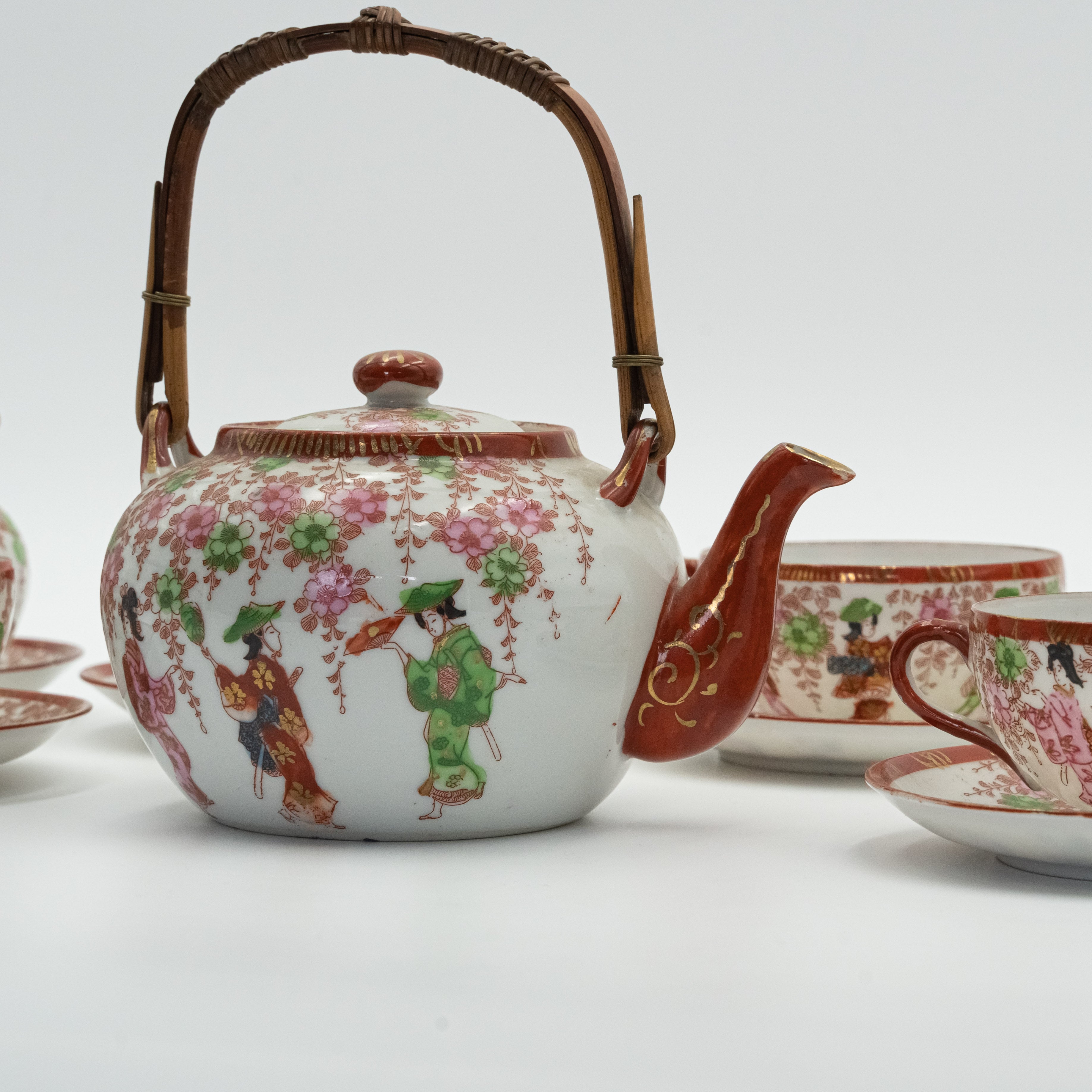 Antique Japanese fine porcelain tea set for 4 persons with hand-painted drawings of Geishas and Samurai