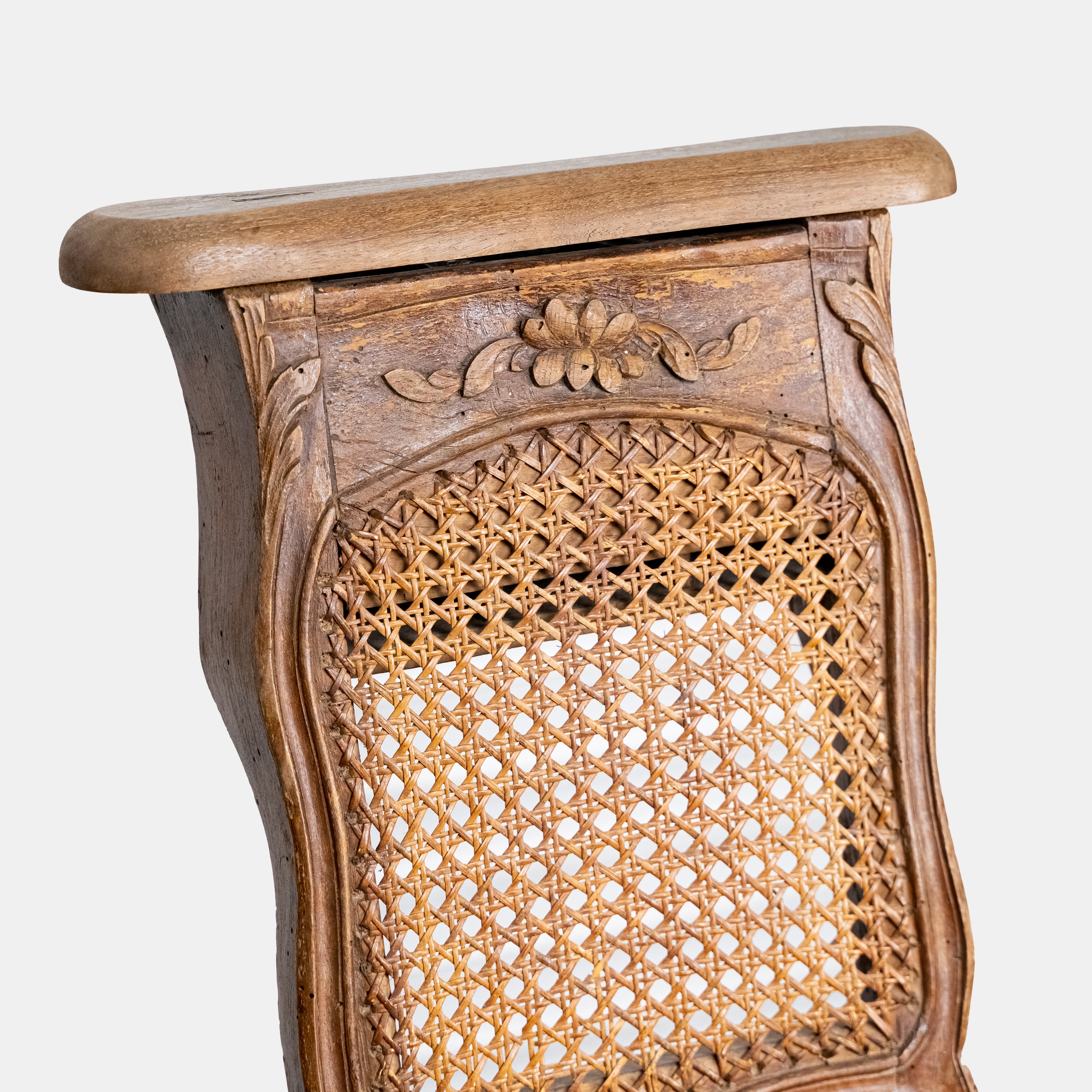 Exclusive and rare 19th-century bidet-chair decorated with floral ornaments with rattan weaving