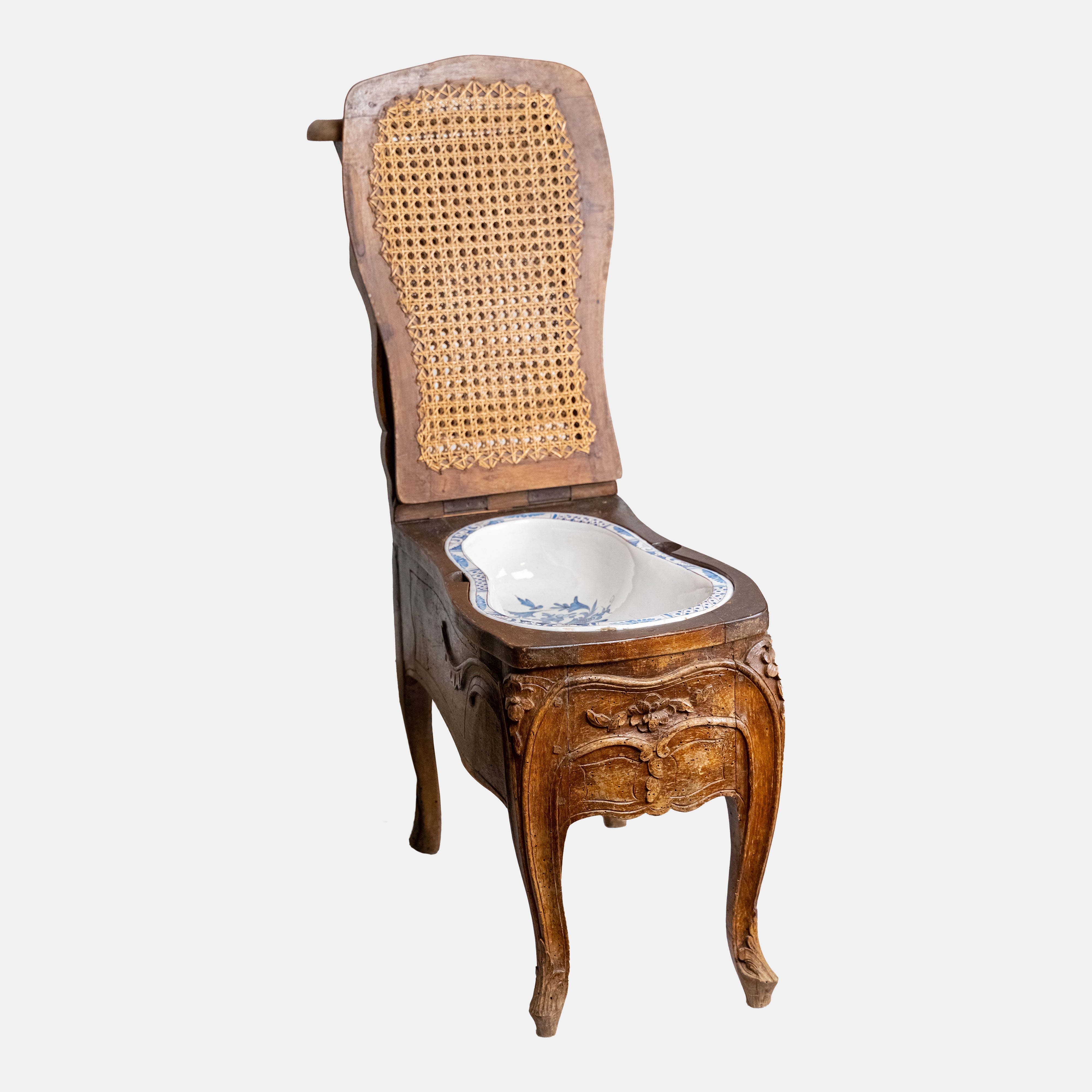 Exclusive and rare 19th-century bidet-chair decorated with floral ornaments with rattan weaving