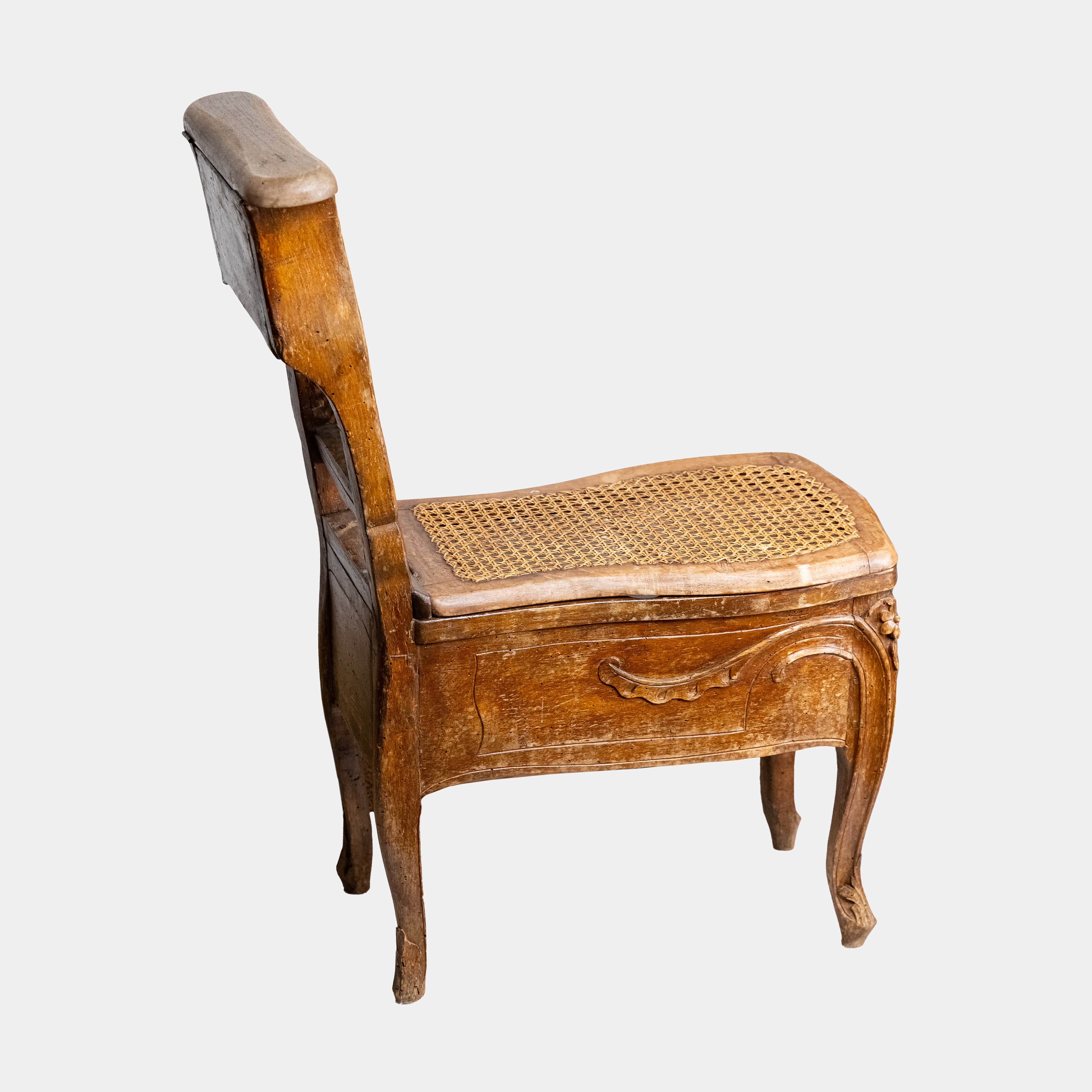 Exclusive and rare 19th-century bidet-chair decorated with floral ornaments with rattan weaving