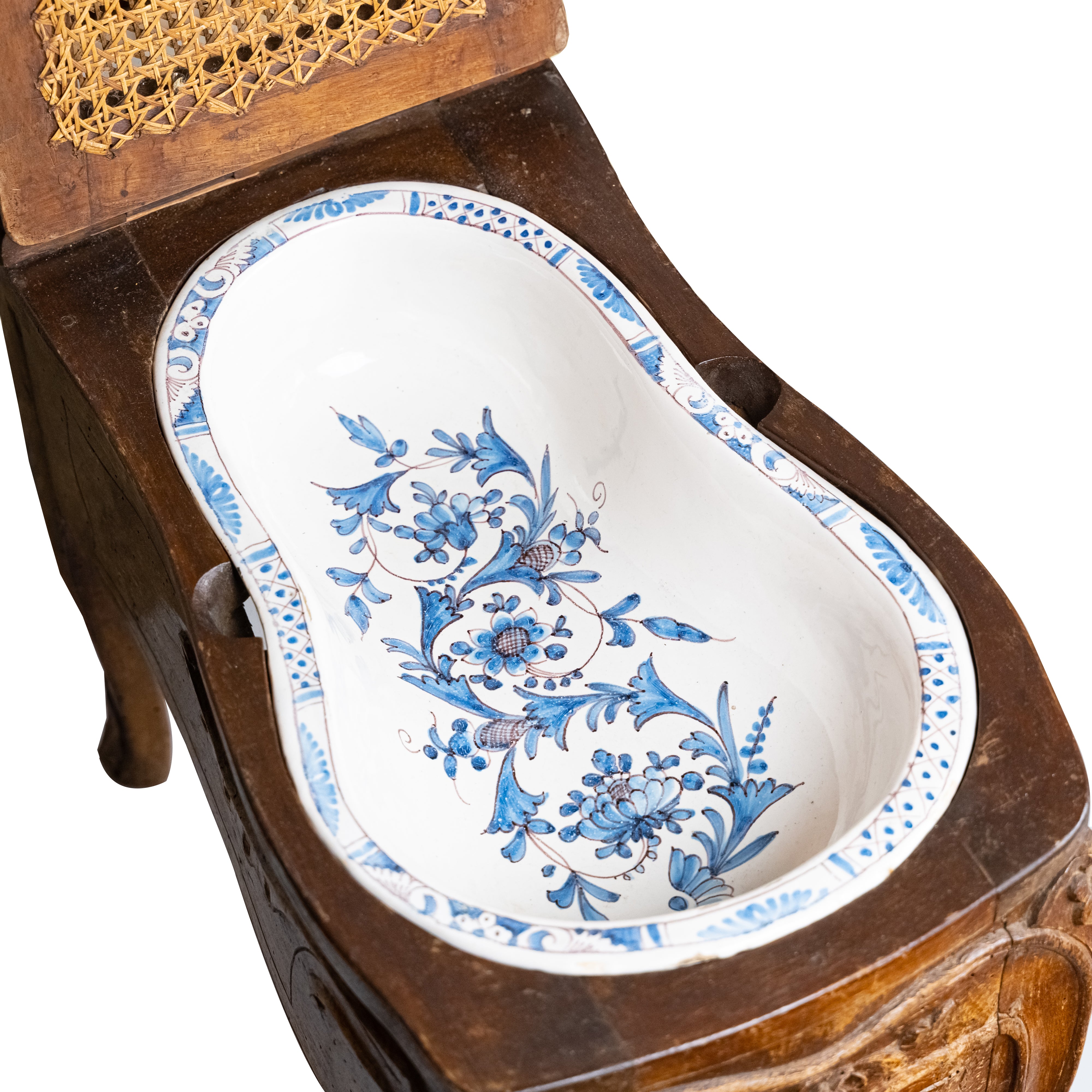 Exclusive and rare 19th-century bidet-chair decorated with floral ornaments with rattan weaving