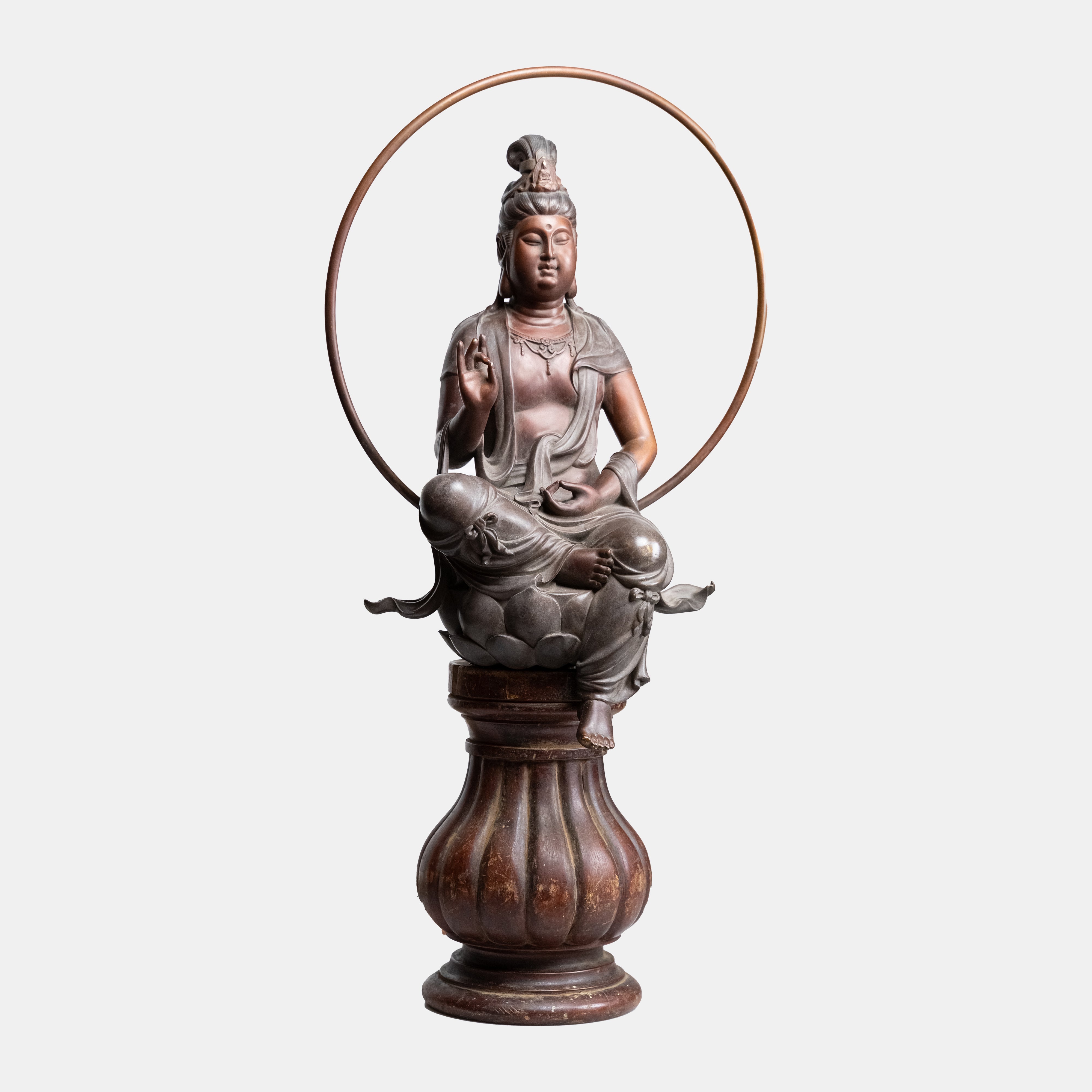 Antique bronze sculpture of the sitting Buddha in Shuni Mudra