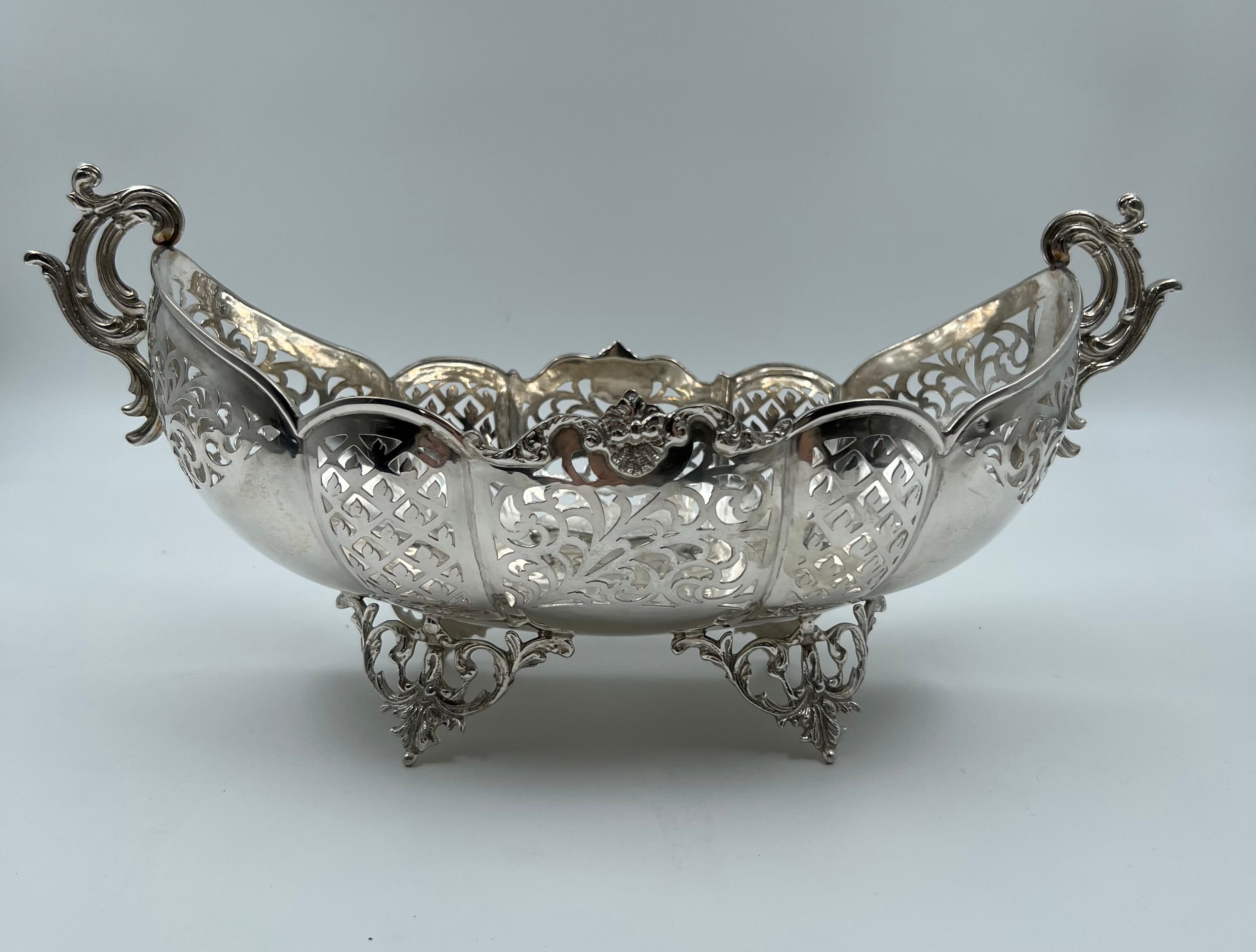 Antique European silver fruit vase of 19th-century featuring a beautifully carved floral decoration with garlands