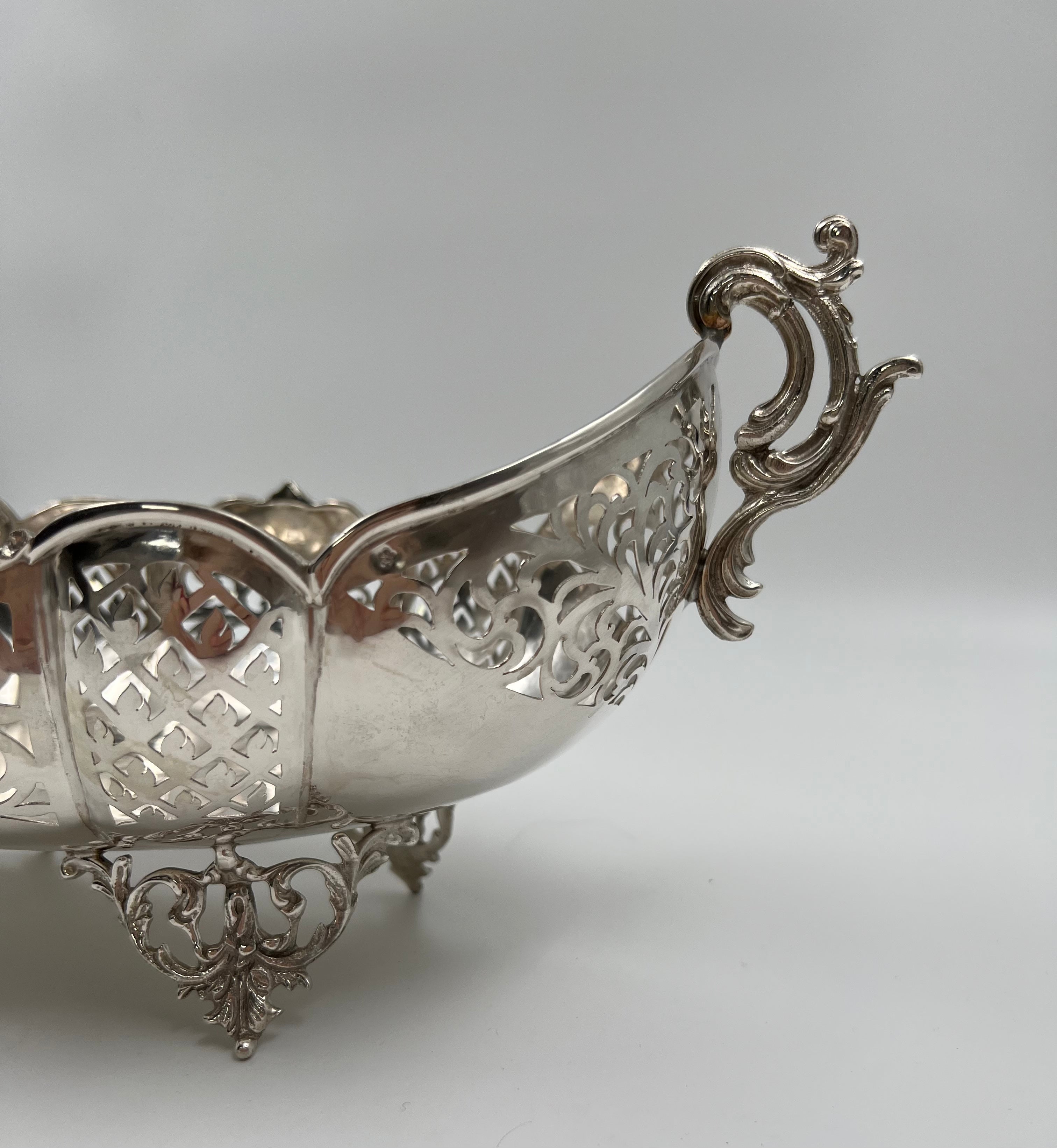 Antique European silver fruit vase of 19th-century featuring a beautifully carved floral decoration with garlands