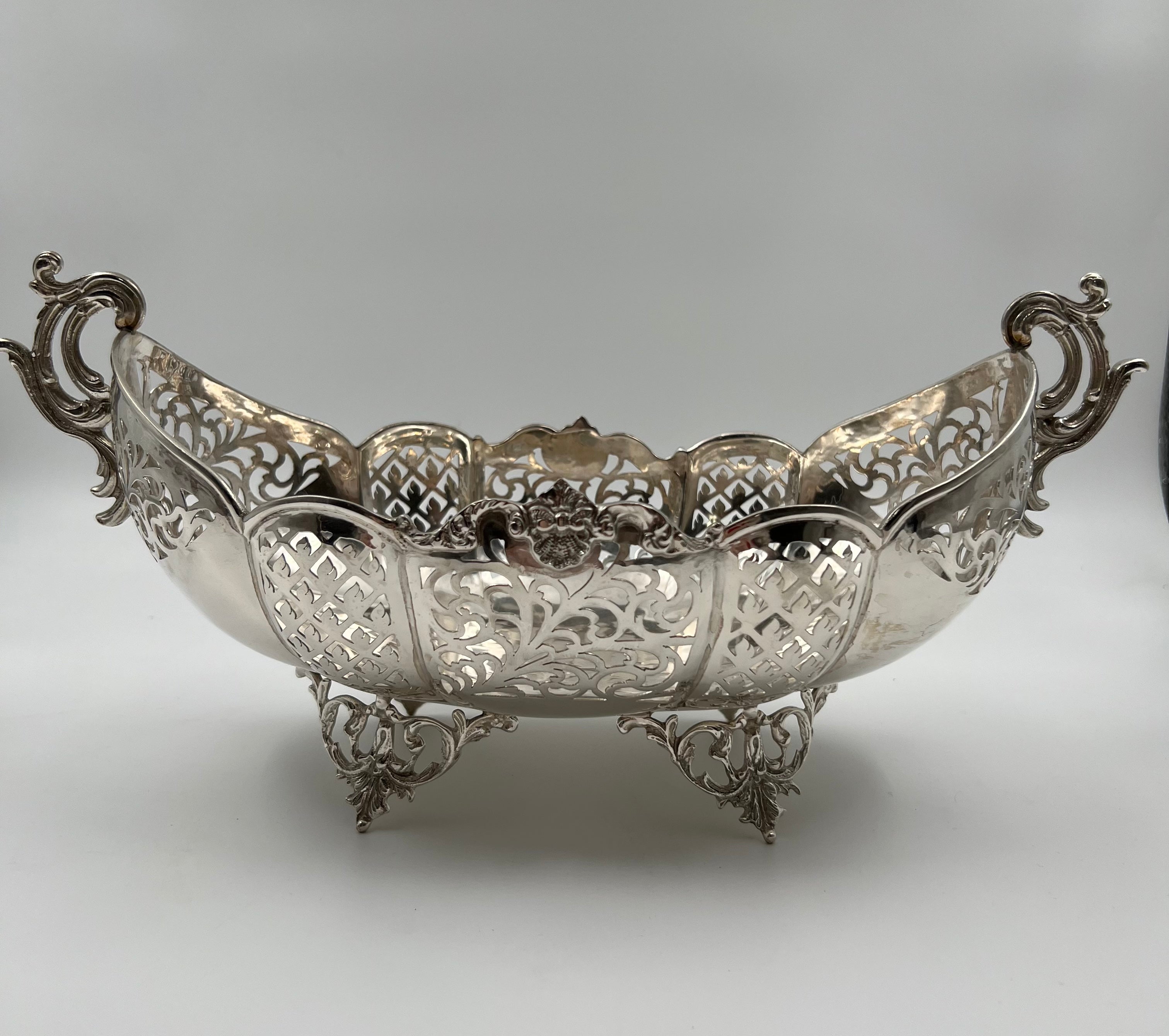 Antique European silver fruit vase of 19th-century featuring a beautifully carved floral decoration with garlands