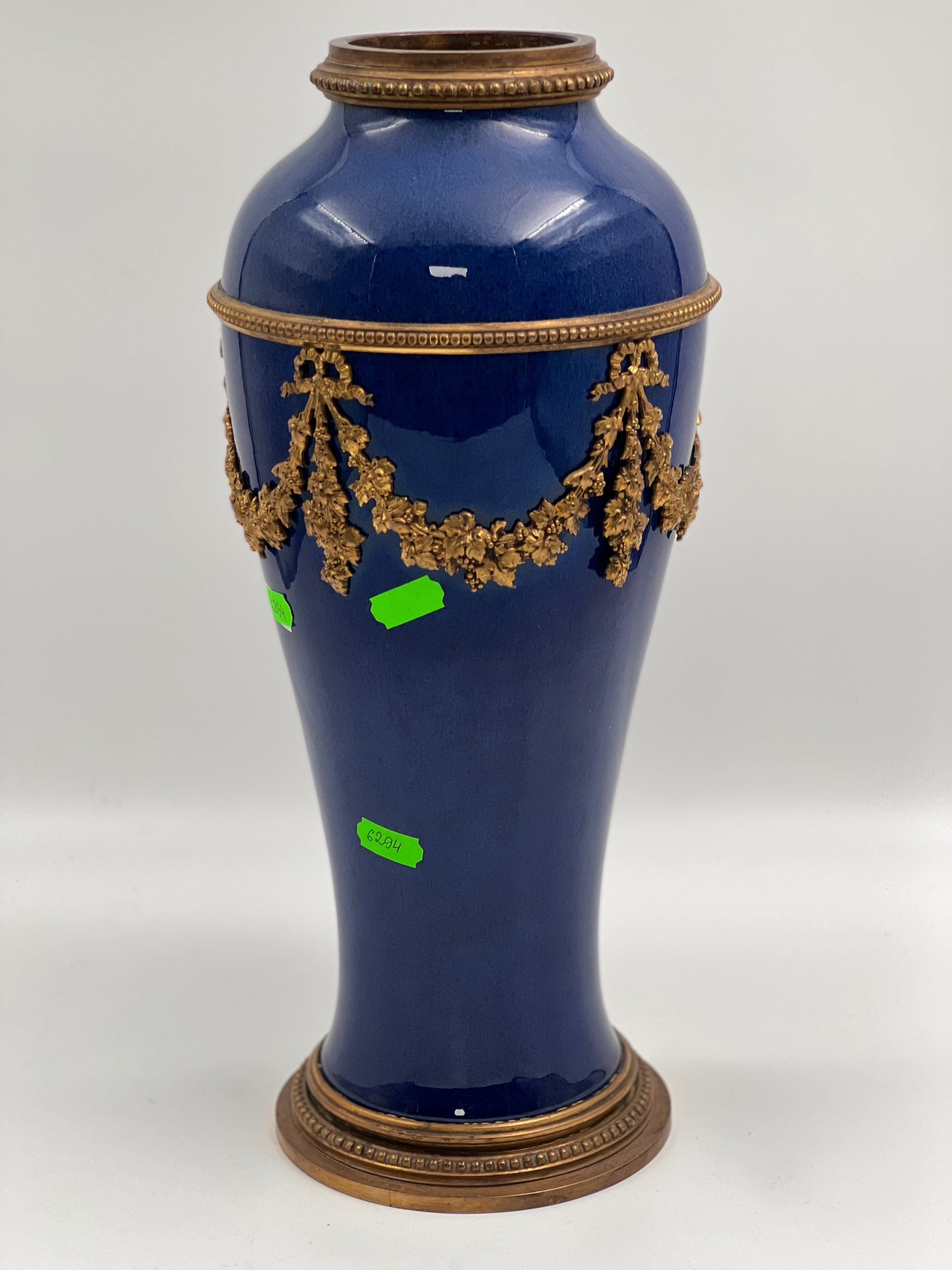 Antique French Sevres cobalt blue porcelain vase with the gilded bronze decor by Paul Milet